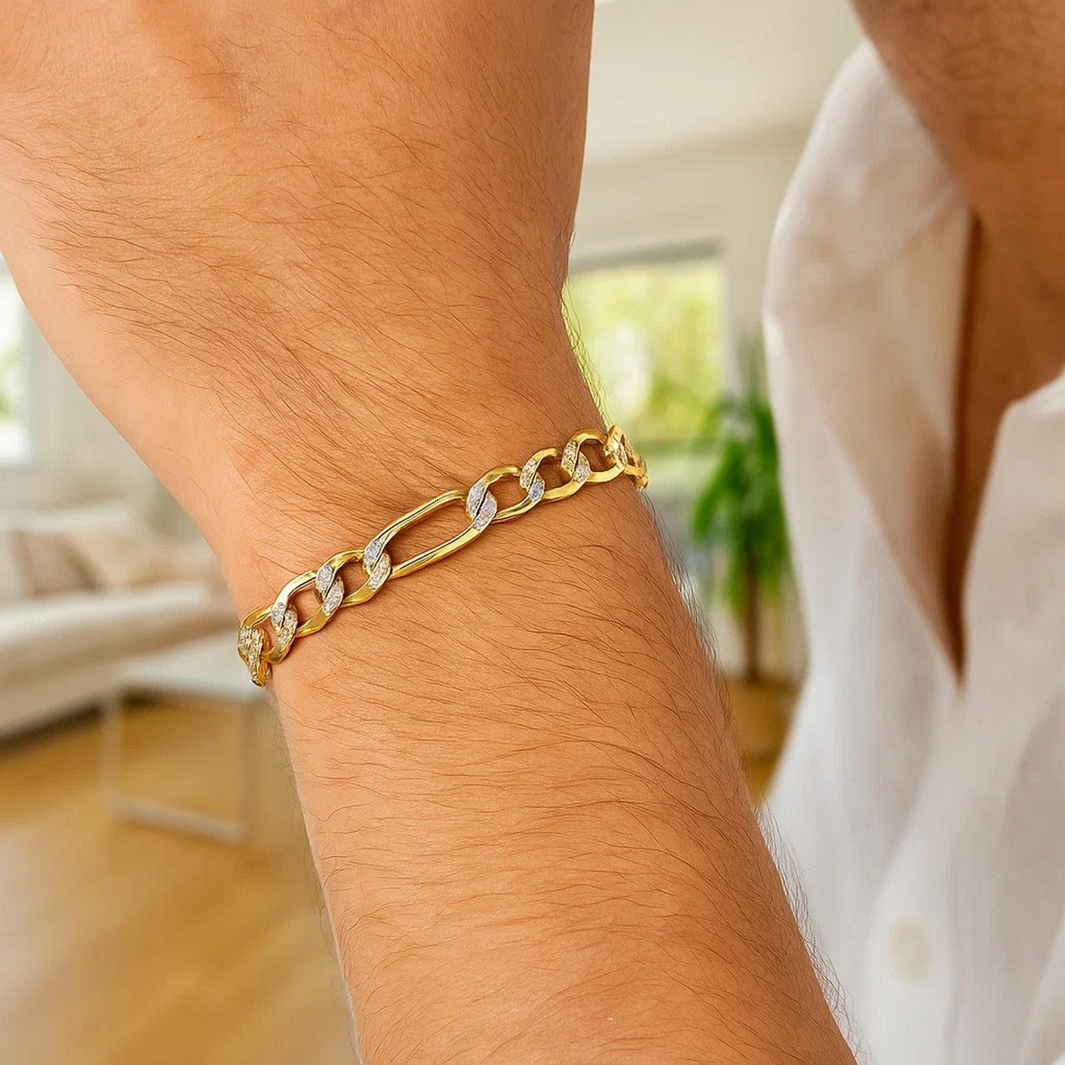Elegant 14k yellow gold pave Figaro bracelet featuring a luxurious chain design, perfect for sophisticated style.