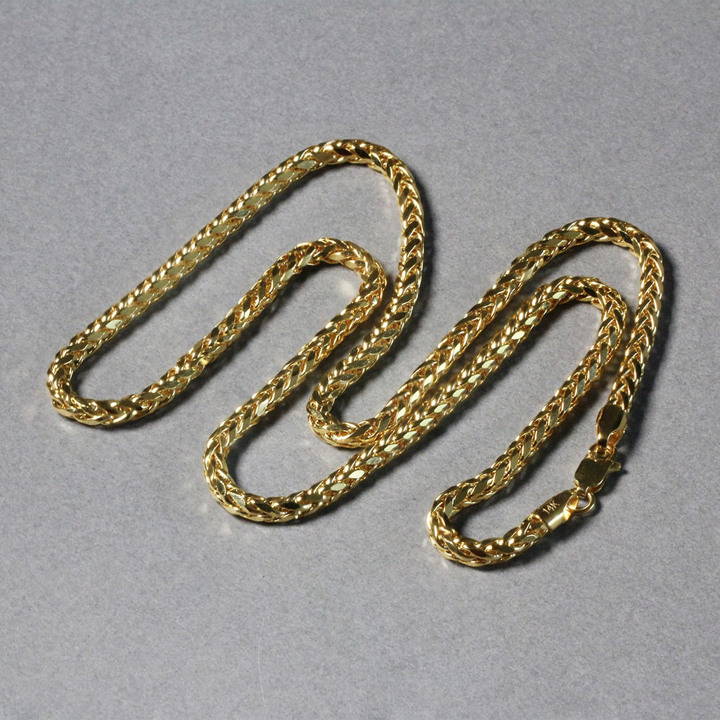 Elegant 14k yellow gold diamond cut round Franco chain, 3.20 mm, showcasing luxurious craftsmanship and timeless style.