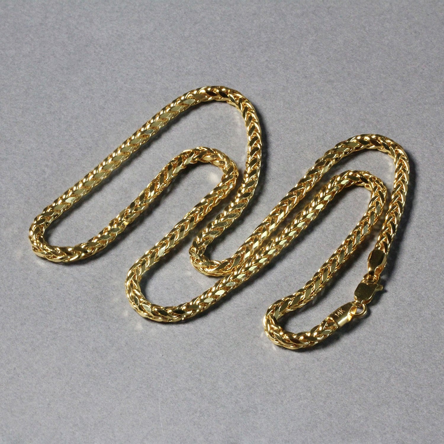 Elegant 14k yellow gold diamond cut round Franco chain, 3.20 mm, showcasing luxurious craftsmanship and timeless style.