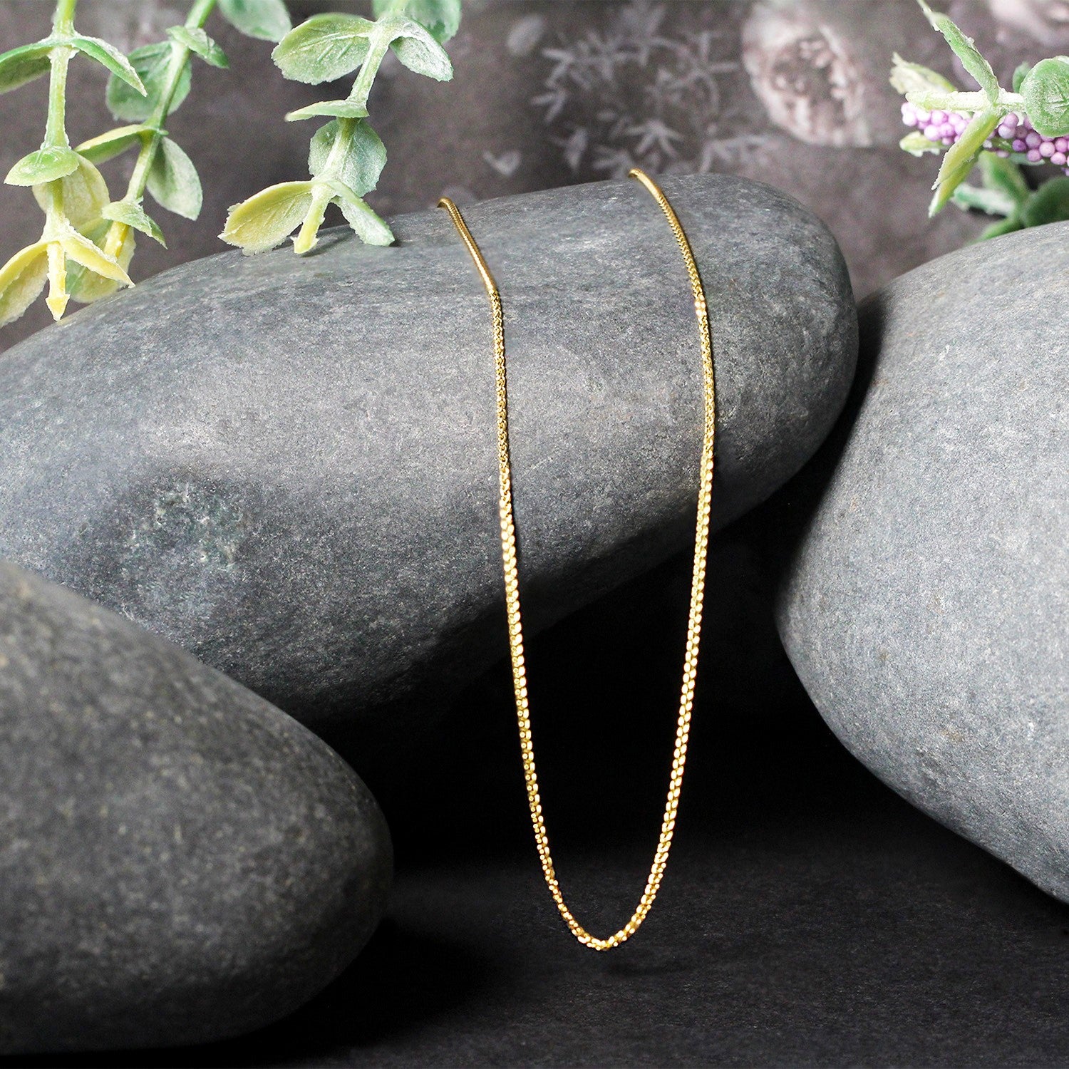 14k yellow gold round wheat chain with modern design, showcasing a sleek 0.80 mm profile and elegant craftsmanship.