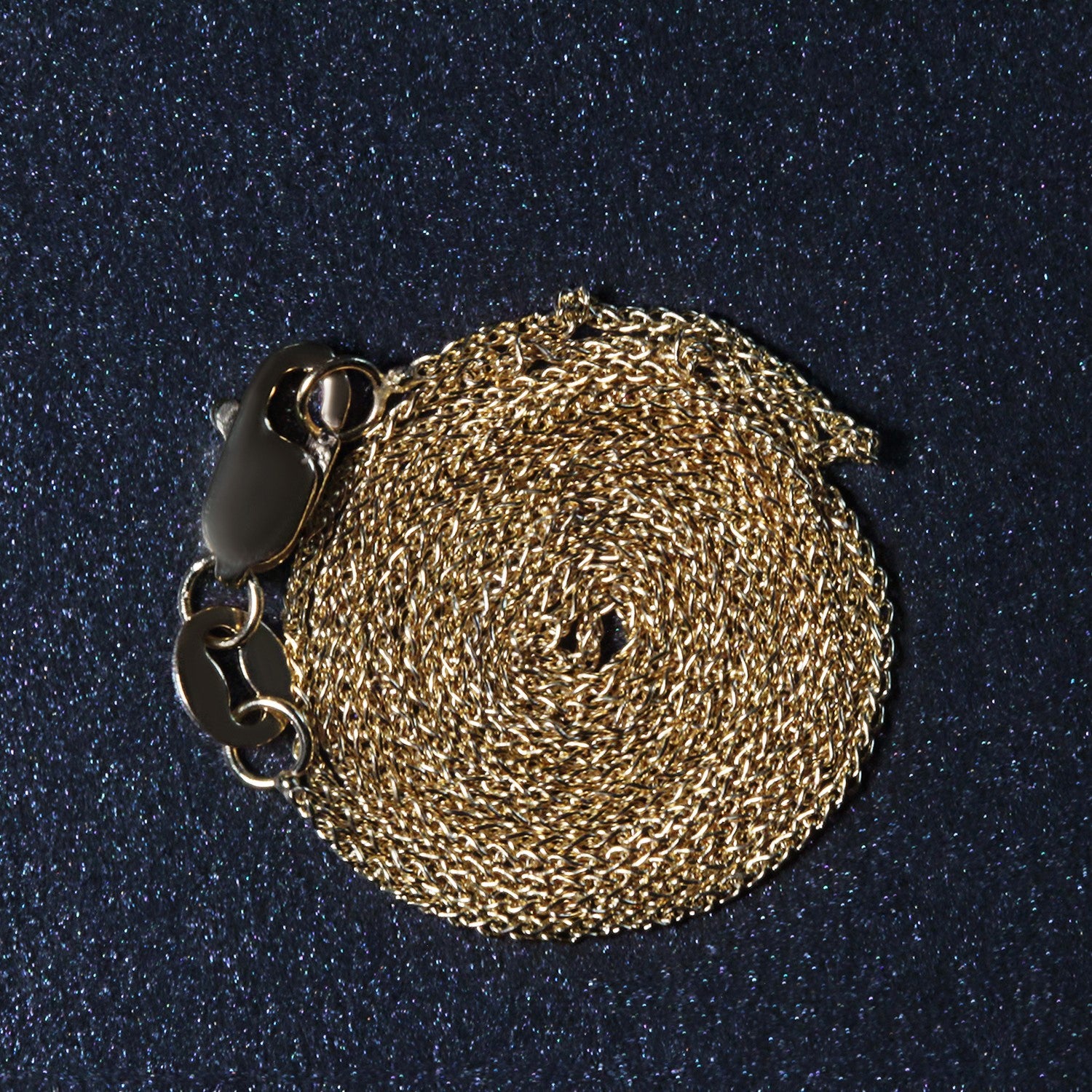14k yellow gold round wheat chain, modern design, 0.80 mm thickness, perfect for layering or standalone elegance.