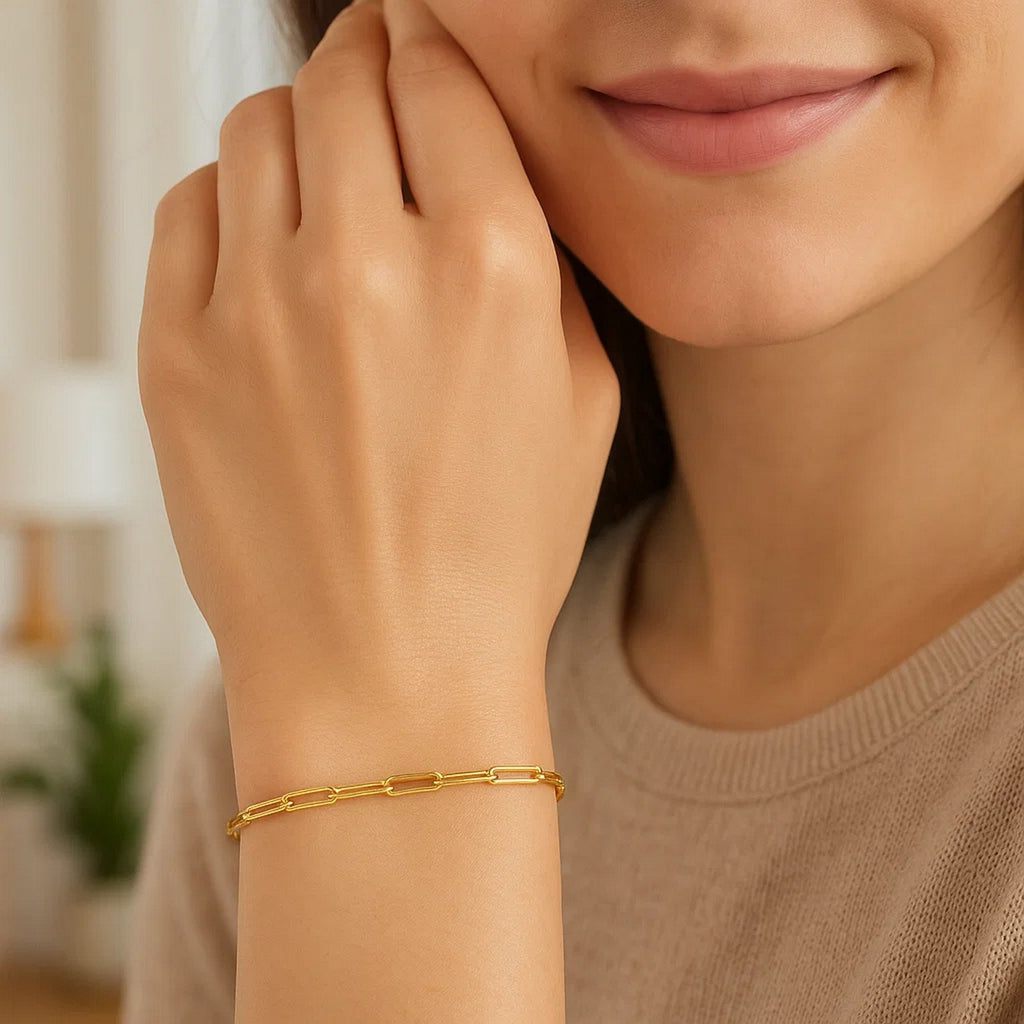 14k yellow gold paperclip bracelet featuring modern links, perfect for layering or elegant solo wear.