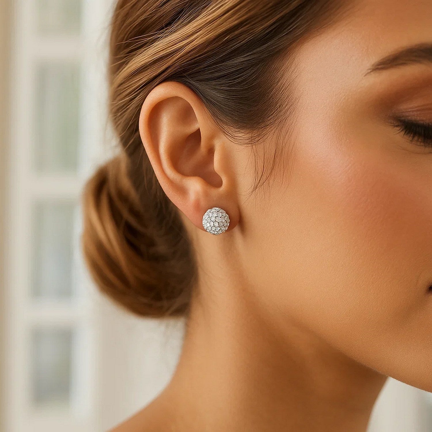 14k yellow gold stud earrings featuring elegant white tone crystal ball design for a luxurious touch.