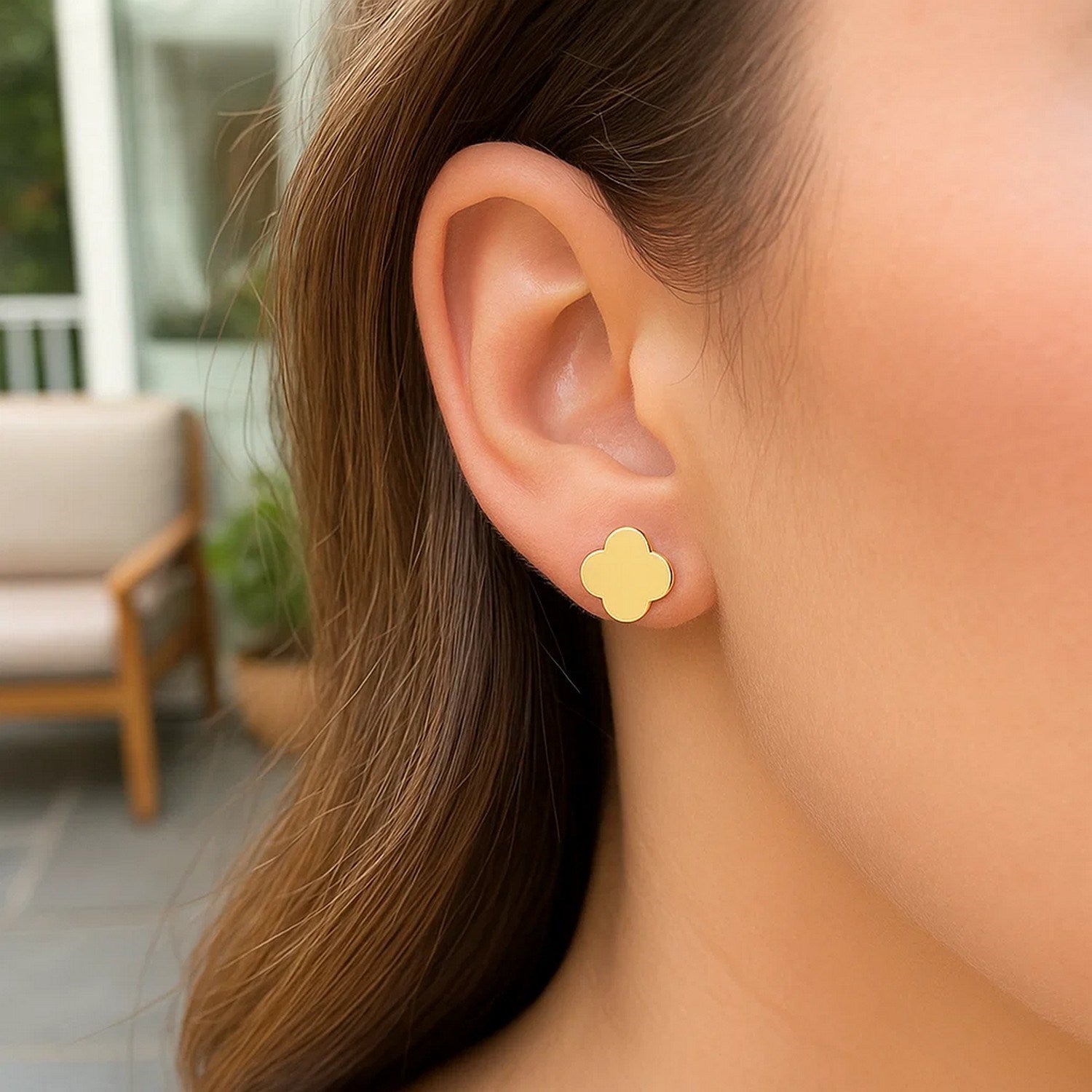 14k yellow gold polished clover stud earrings with a modern design, perfect for elegant everyday wear.