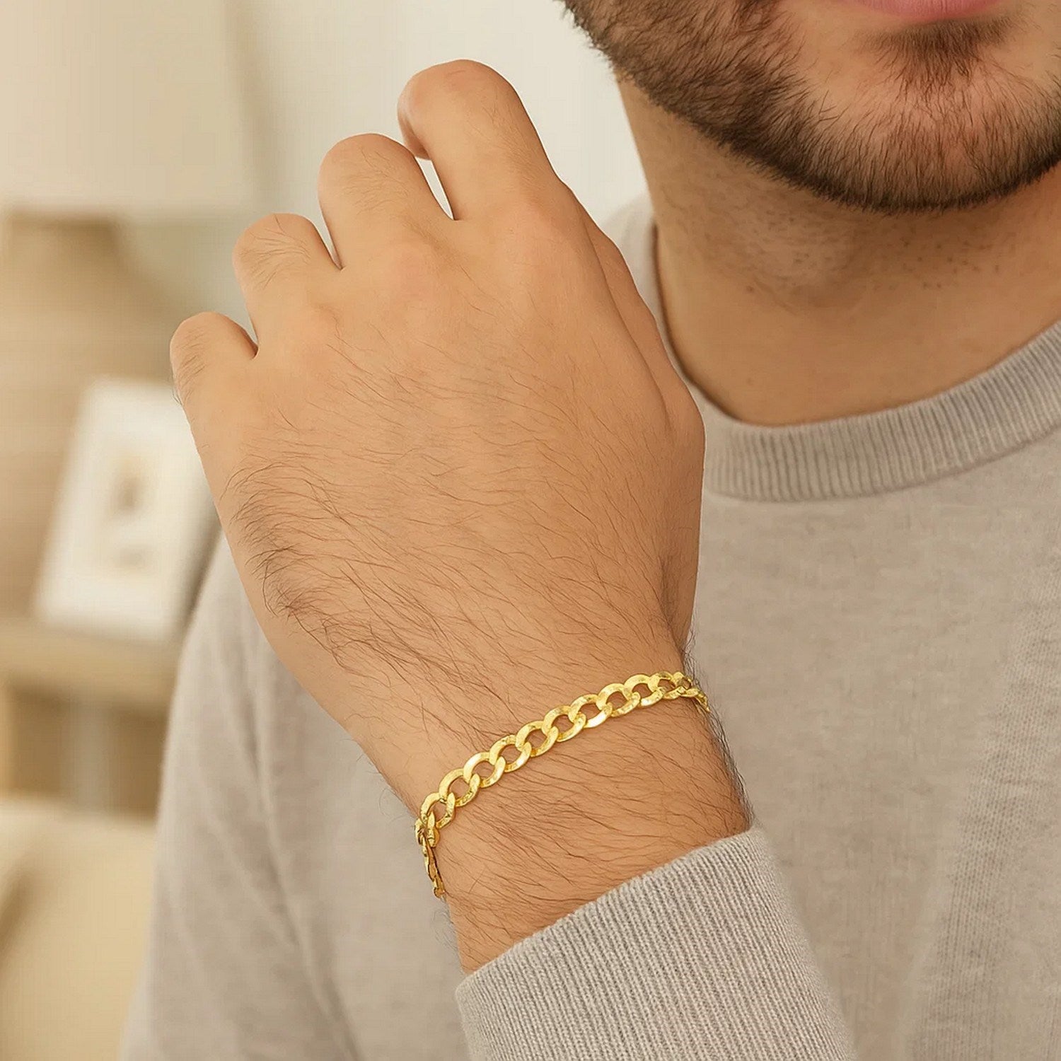 Elegant 10k yellow gold curb bracelet featuring a sleek chain design, perfect for luxurious everyday wear.