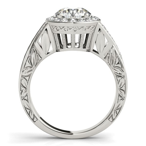 Halo set diamond engagement ring in 14k white gold featuring a stunning round center stone and modern design elegance.