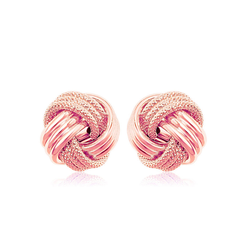 14k rose gold textured love knot earrings, embodying modern luxury with an elegant twist design.