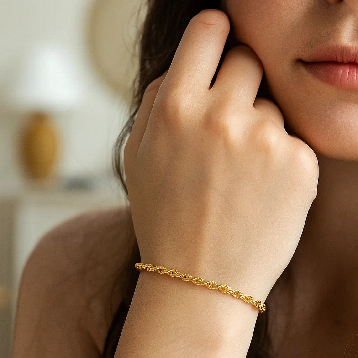 10k yellow gold diamond cut rope bracelet featuring a contemporary design and intricate chain detail.