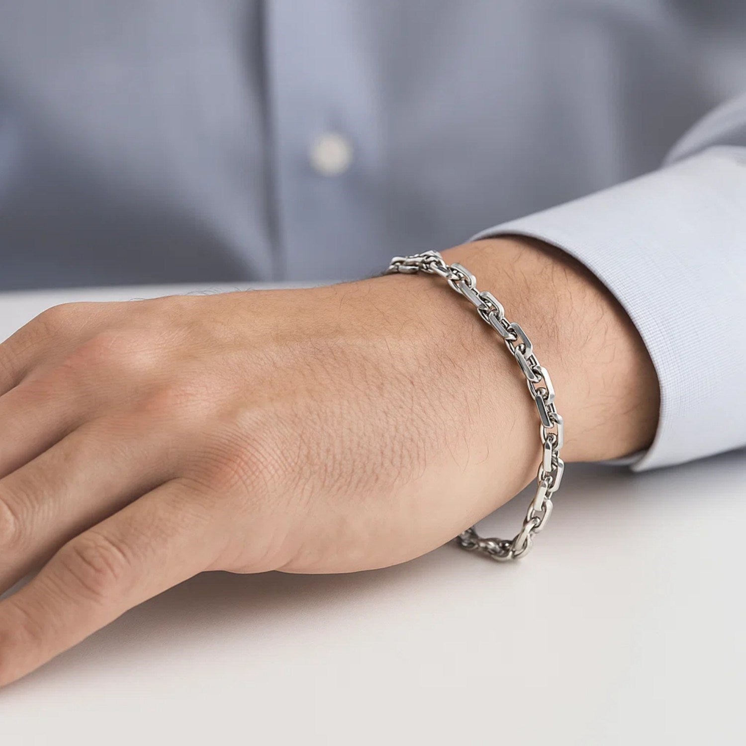 14k white gold French cable chain bracelet featuring a modern design with elegant round links.
