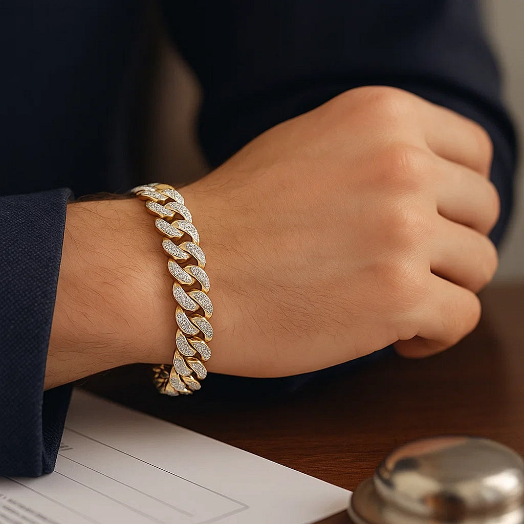 14k two-tone gold curb chain bracelet featuring diamond pave links in a contemporary design, perfect for luxury styling.
