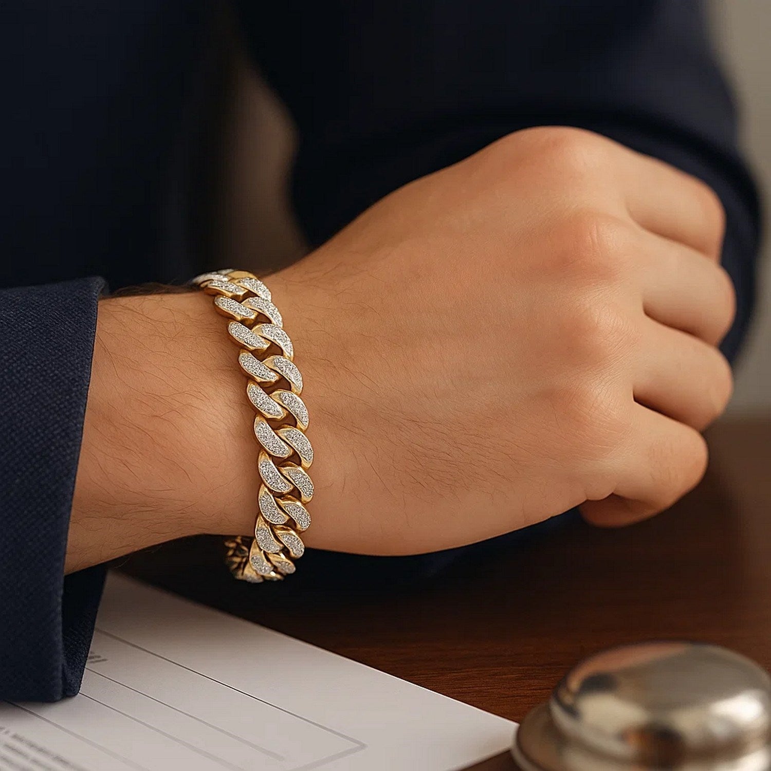 14k two-tone gold curb chain bracelet featuring diamond pave links in a contemporary design, perfect for luxury styling.