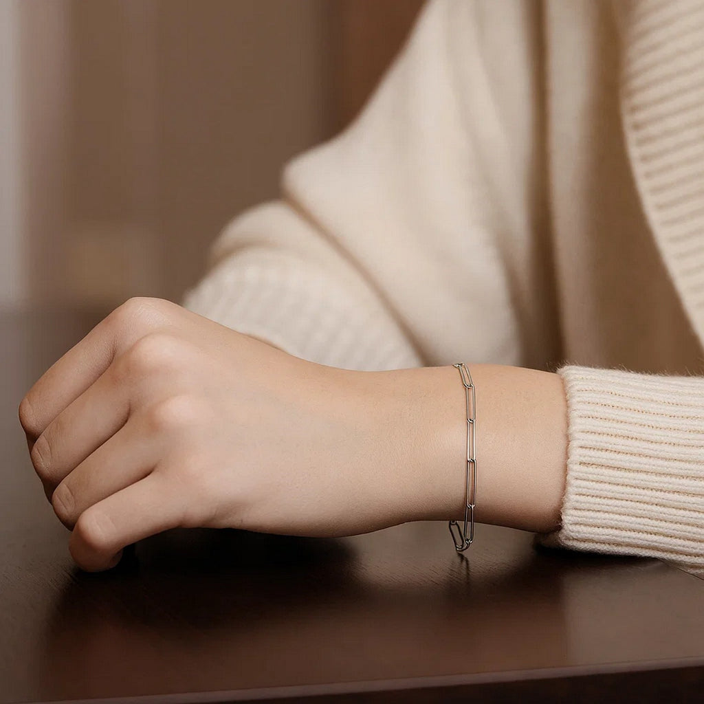 14k white gold wire paperclip bracelet with modern design, featuring sleek links for a luxurious touch.