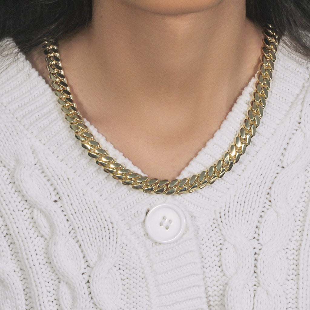 14k yellow gold classic Miami Cuban solid chain, 10.10 mm width, exuding timeless elegance and luxury craftsmanship.