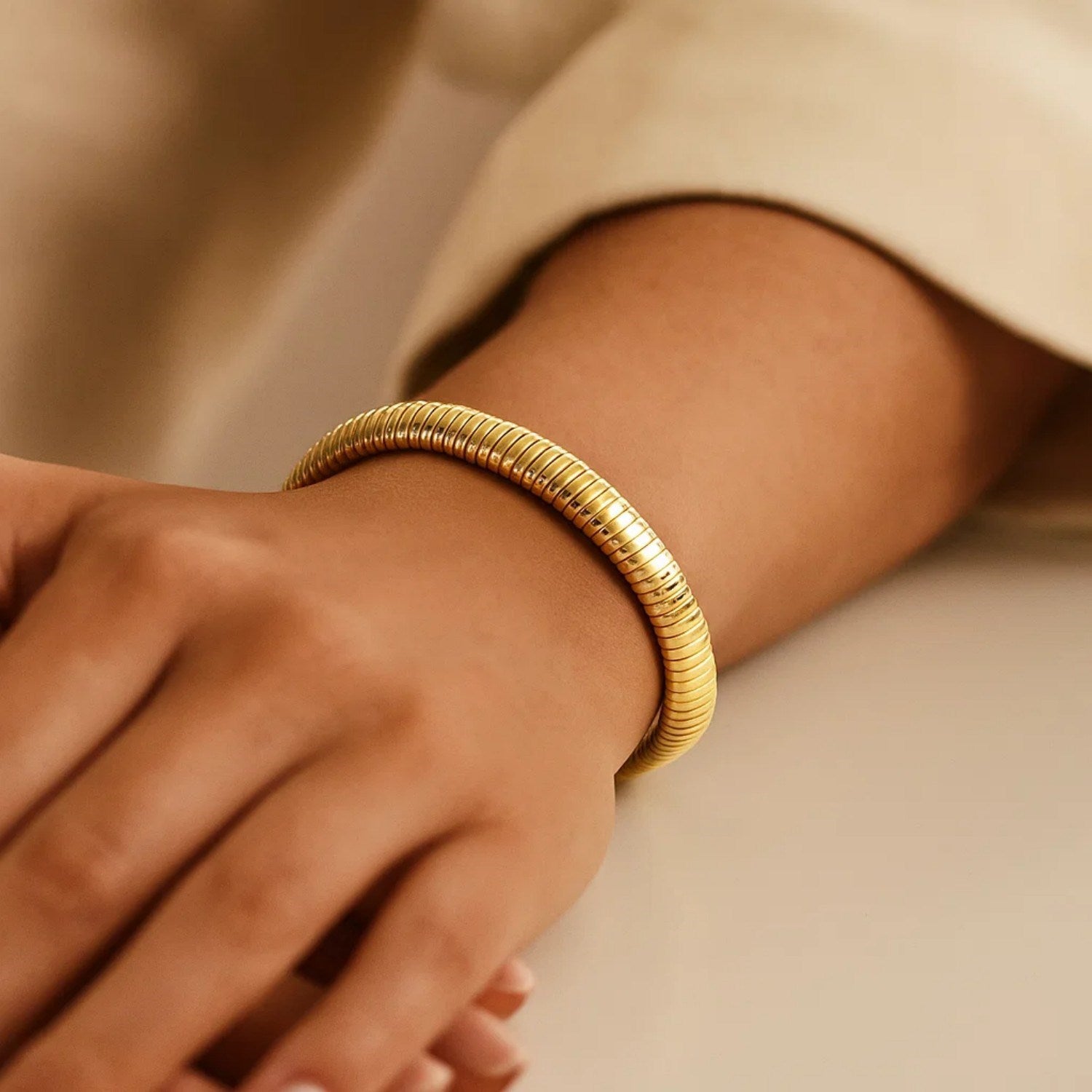 14k yellow gold Tubogas bracelet with a modern design, showcasing a luxurious 9.00 mm width and elegant craftsmanship.