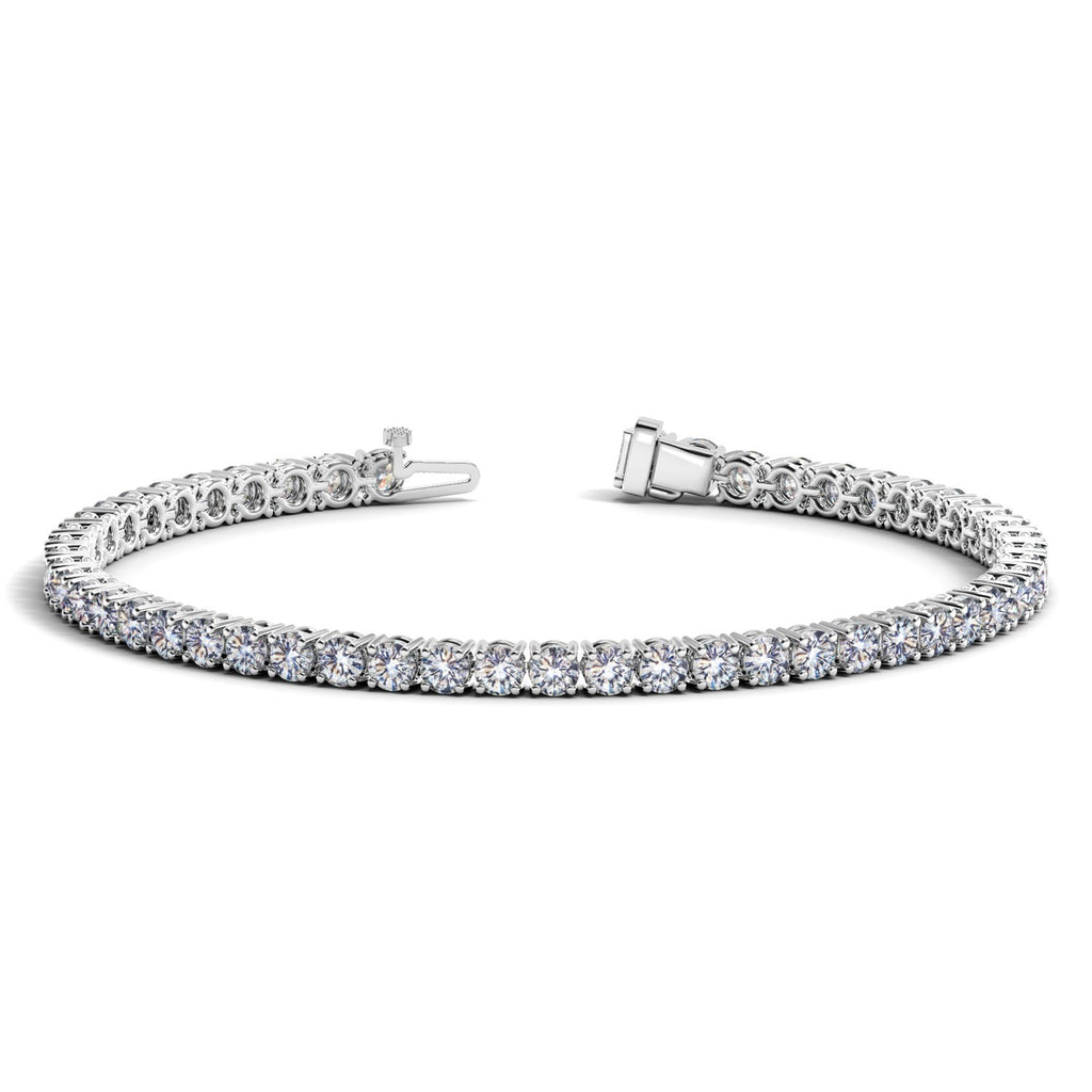 Lab grown round diamond tennis bracelet in 14k white gold, featuring 6 cctw of F/G VS2/SI1 diamonds for a modern elegance.