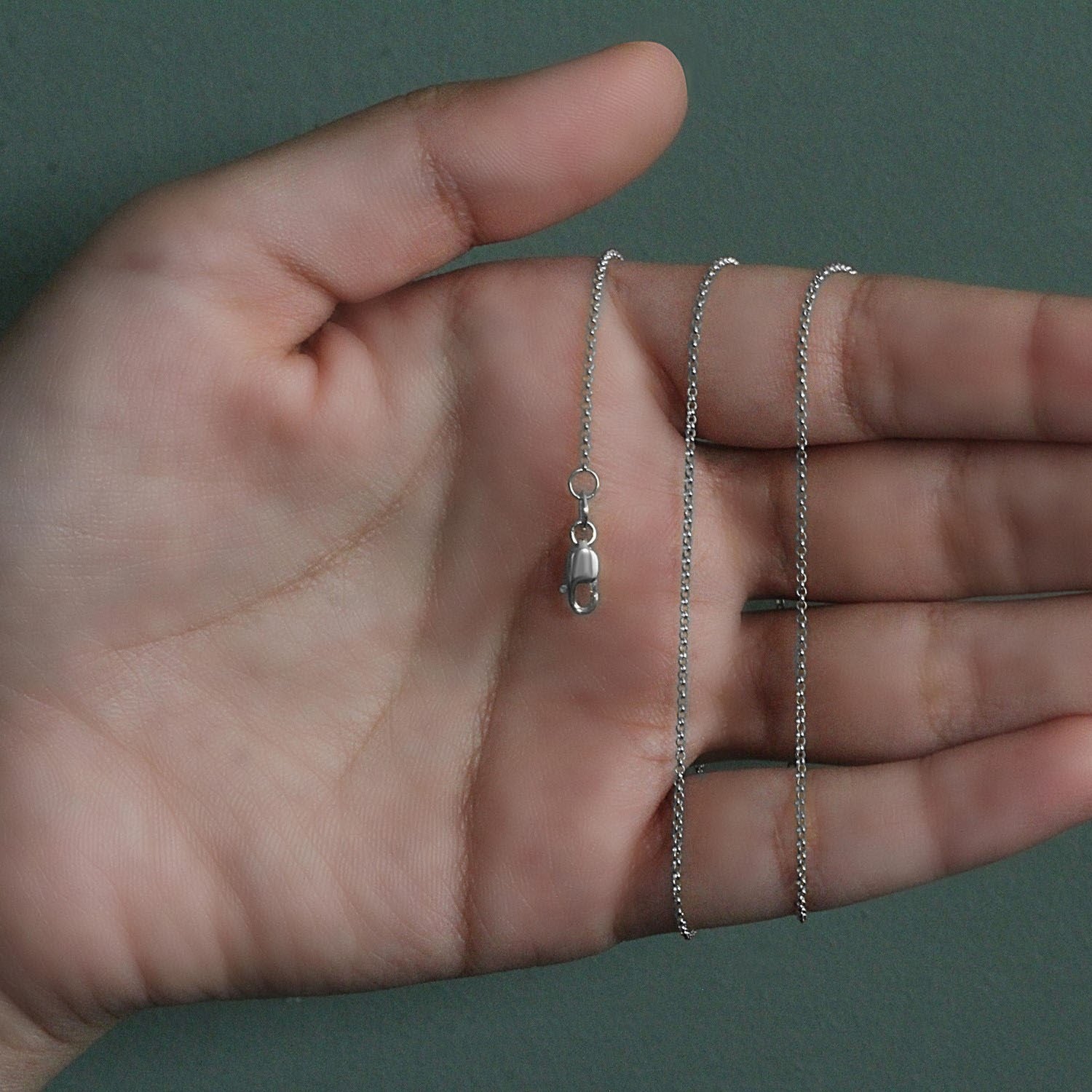 14k white gold diamond cut rolo chain, contemporary design, 1.10 mm width, perfect for layering or standalone elegance.