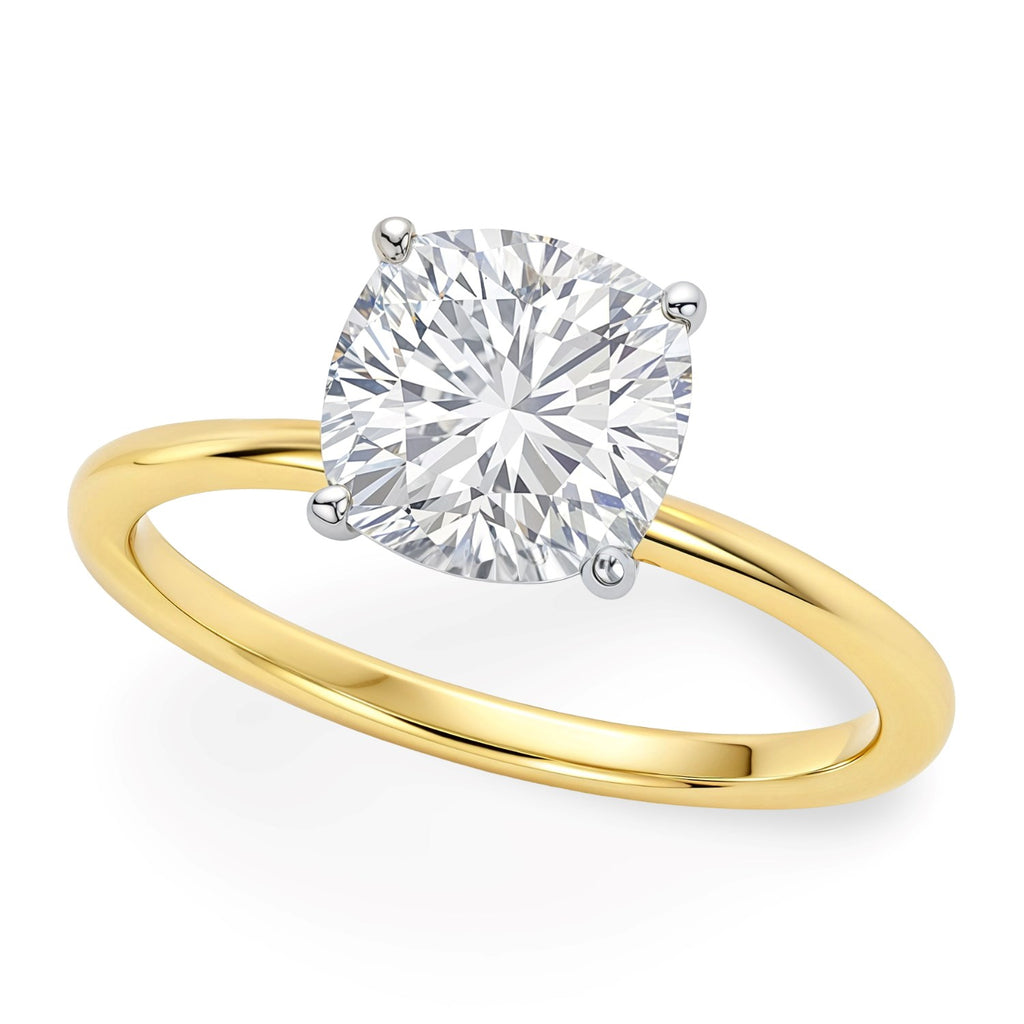 3 carat cushion cut lab-grown diamond solitaire ring in 10K yellow gold, showcasing modern elegance and timeless luxury.