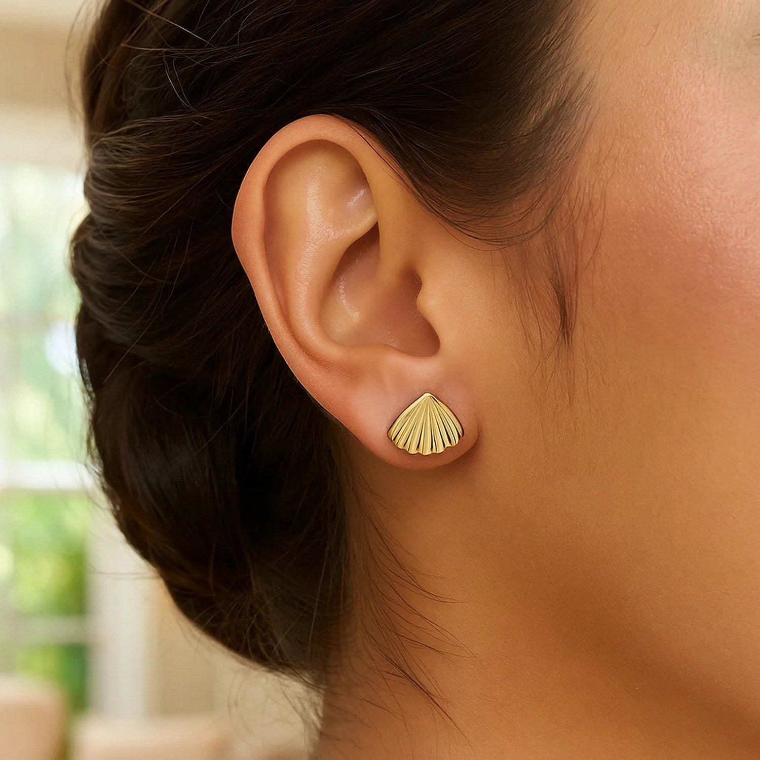 10K yellow gold sea shell stud earrings featuring a contemporary cushion cut design for elegant sophistication.