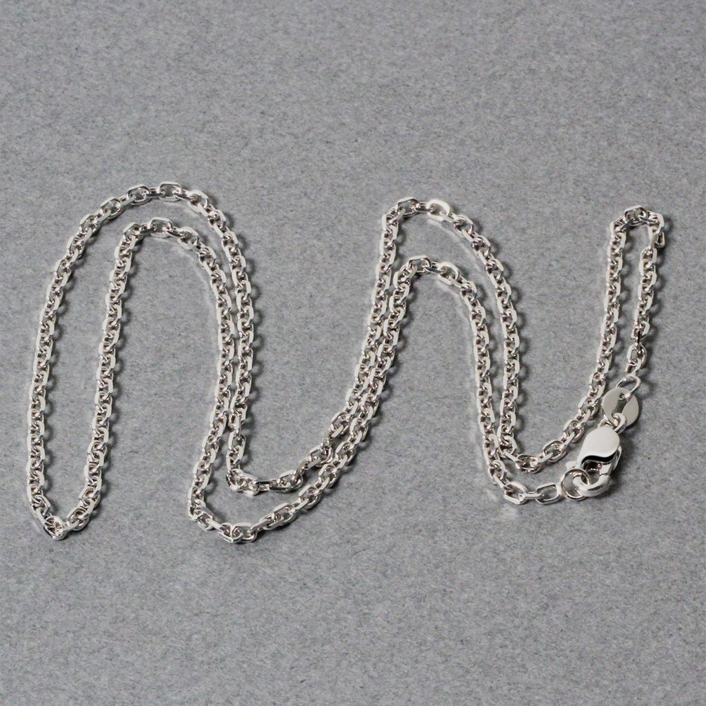 Elegant 18k white gold diamond cut cable link chain, 1.90 mm, showcasing exquisite craftsmanship and timeless style.