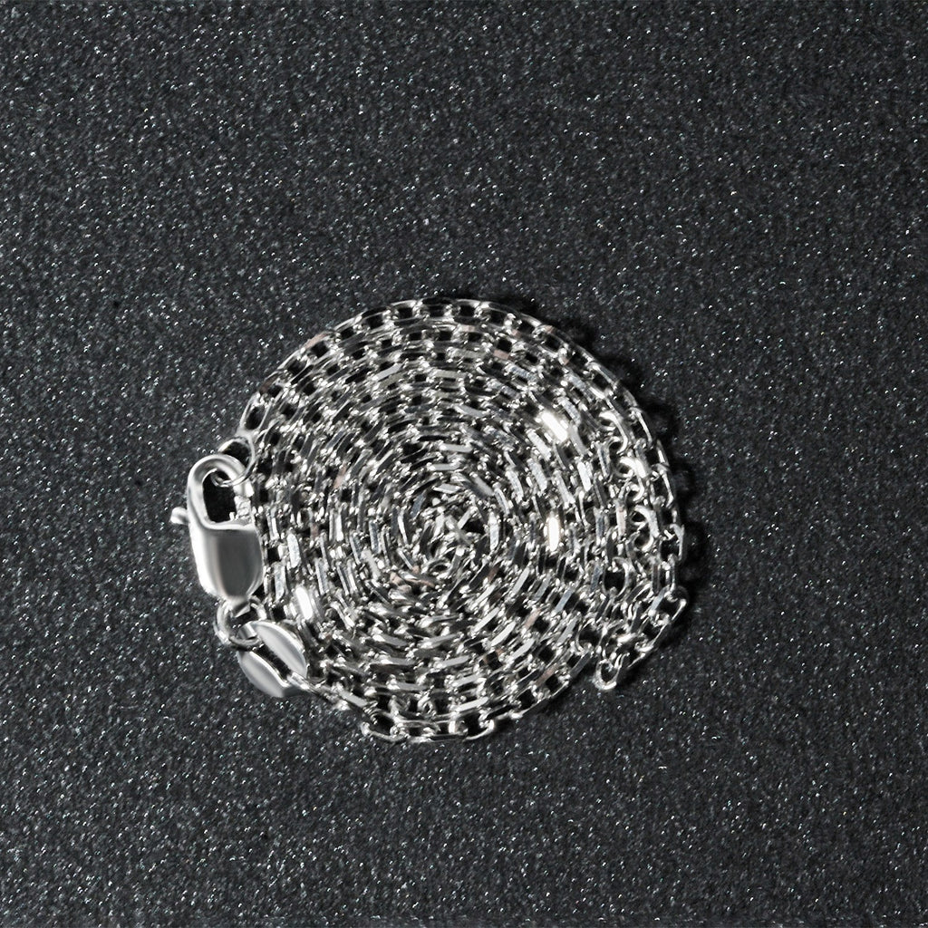 Elegant 18k white gold diamond cut cable link chain, 1.90 mm, showcasing exquisite craftsmanship and timeless style.