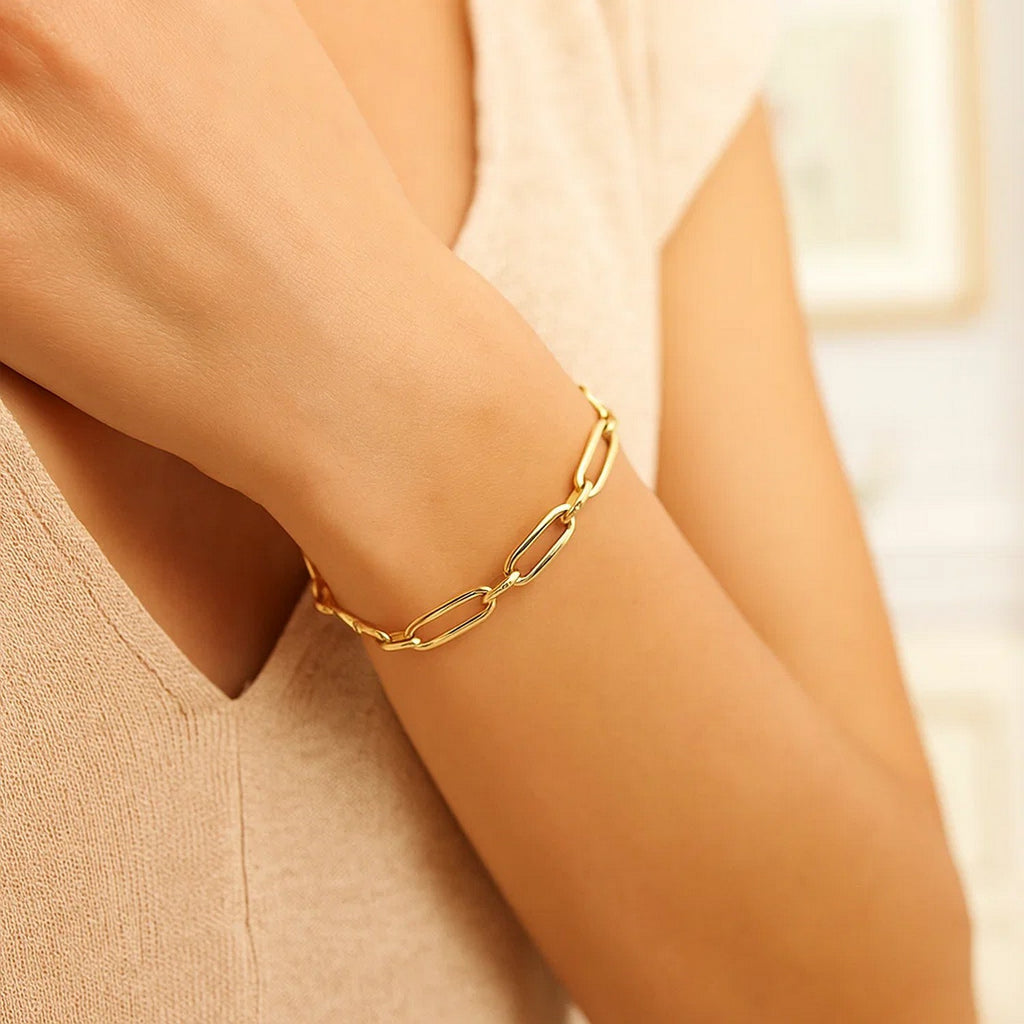 14k yellow gold Bombay paperclip chain bracelet, modern design, 7 1/4 inches, featuring elegant link details.