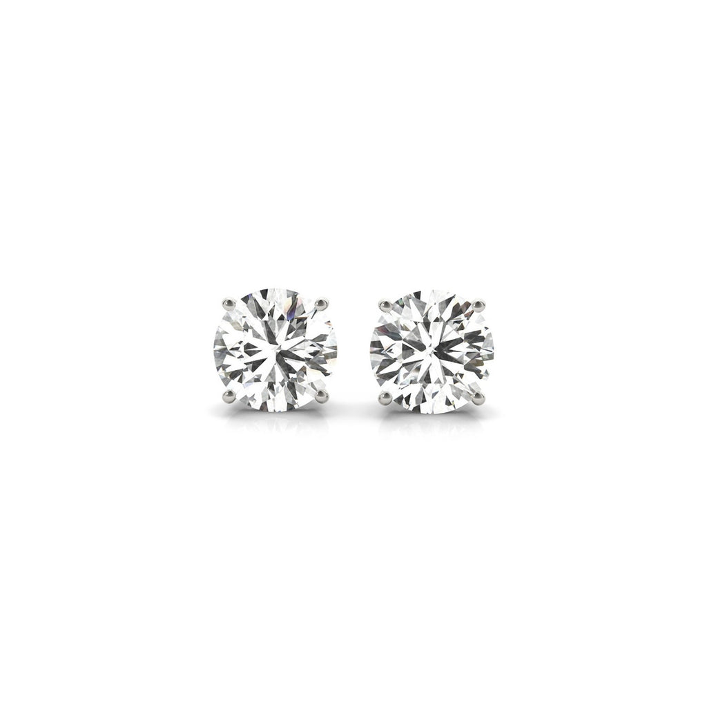 14k white gold round diamond stud earrings featuring G/VS2 clarity, a timeless classic for elegant occasions.