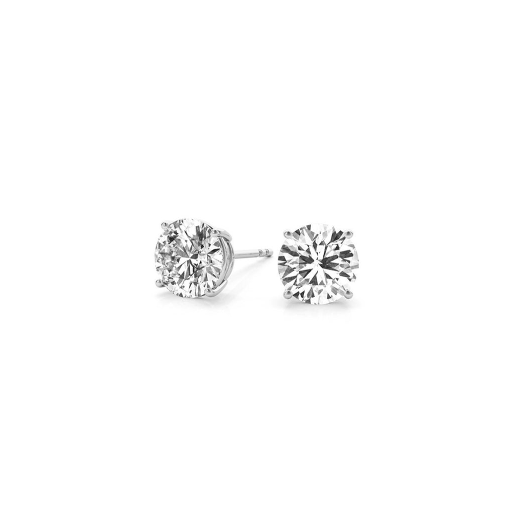 14k white gold round diamond stud earrings featuring G/VS2 clarity, a timeless classic for elegant occasions.