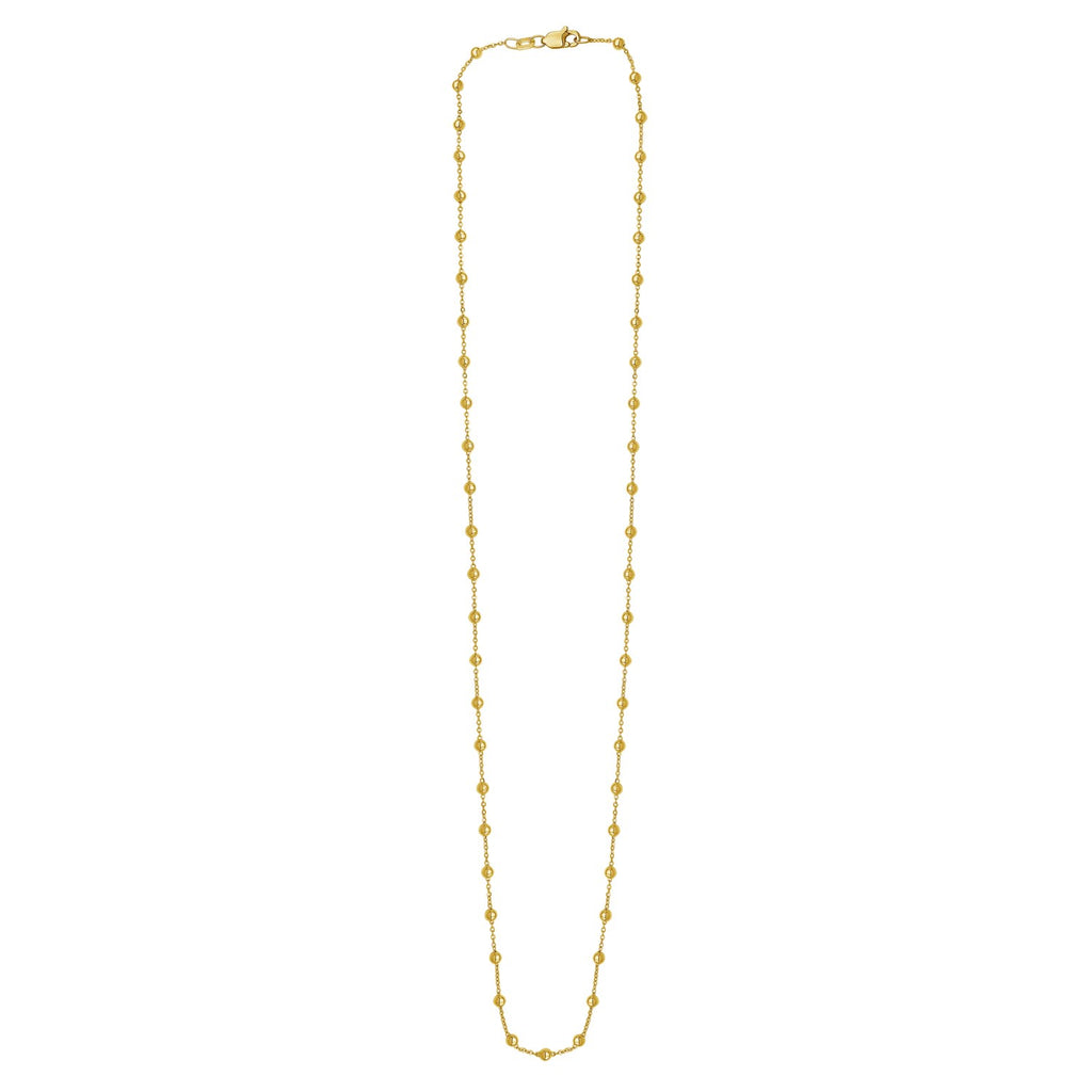 Layering Saturn bead necklace in elegant 14K yellow gold with a delicate round chain design.
