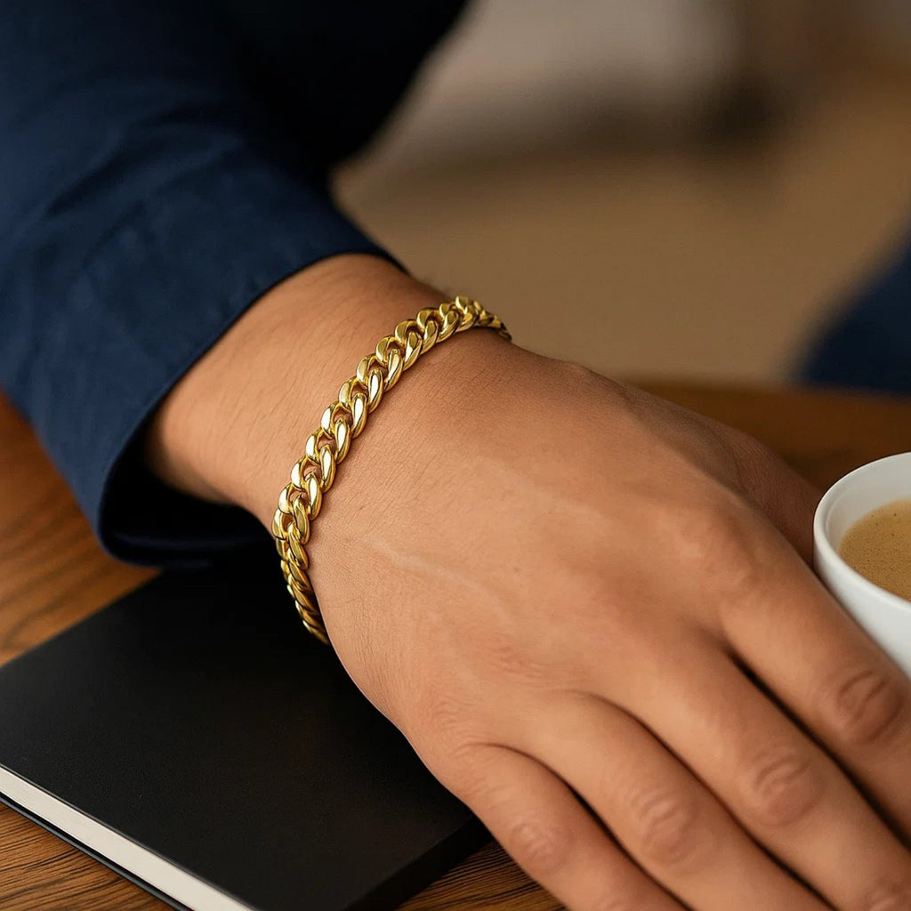 14k yellow gold classic Miami Cuban bracelet, 7.10 mm, featuring a sleek link design for modern elegance.