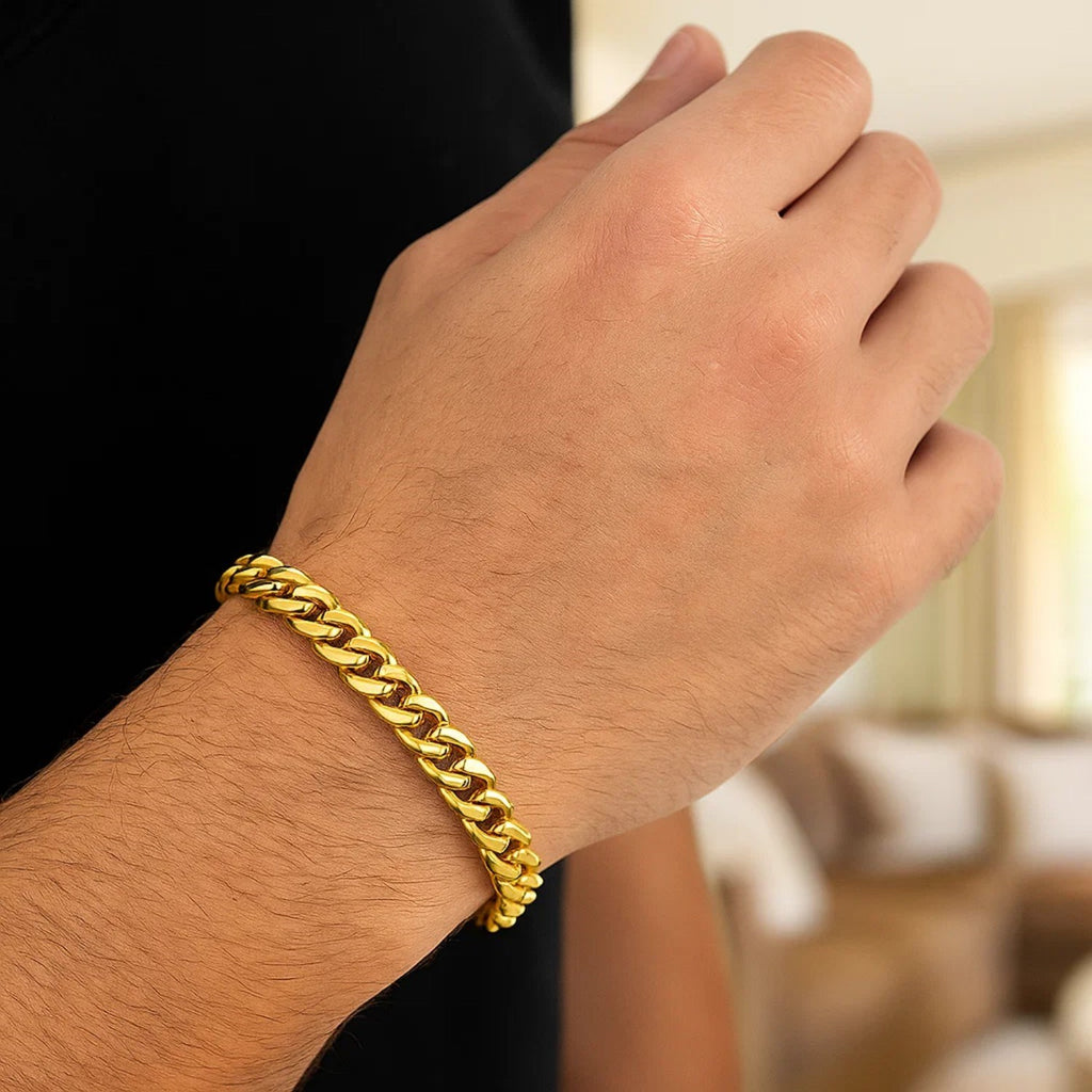 14k yellow gold classic Miami Cuban bracelet featuring solid links, modern design, and luxurious shine.