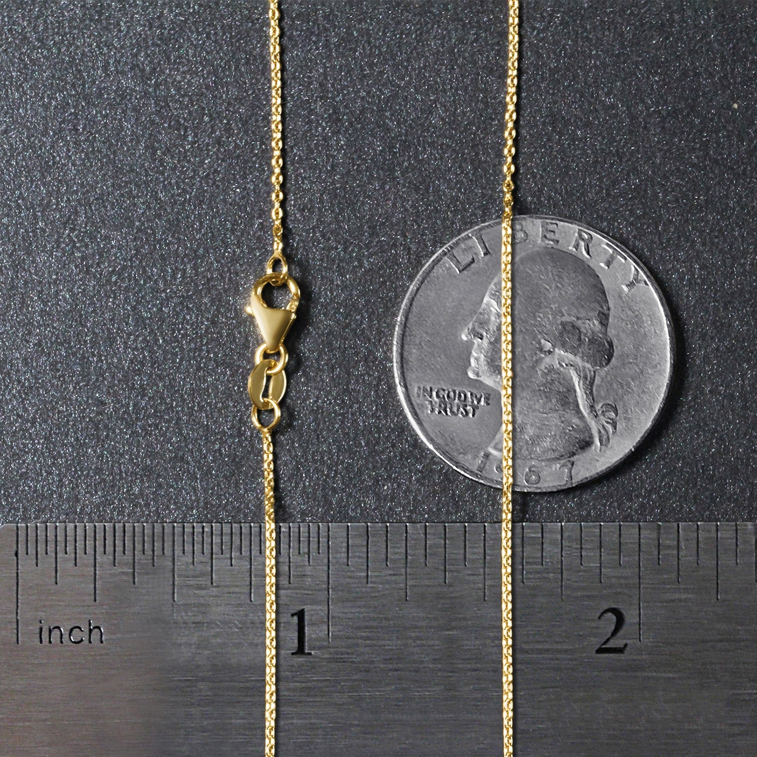 Elegant 18k yellow gold round cable link chain, showcasing a refined design with a lustrous finish.