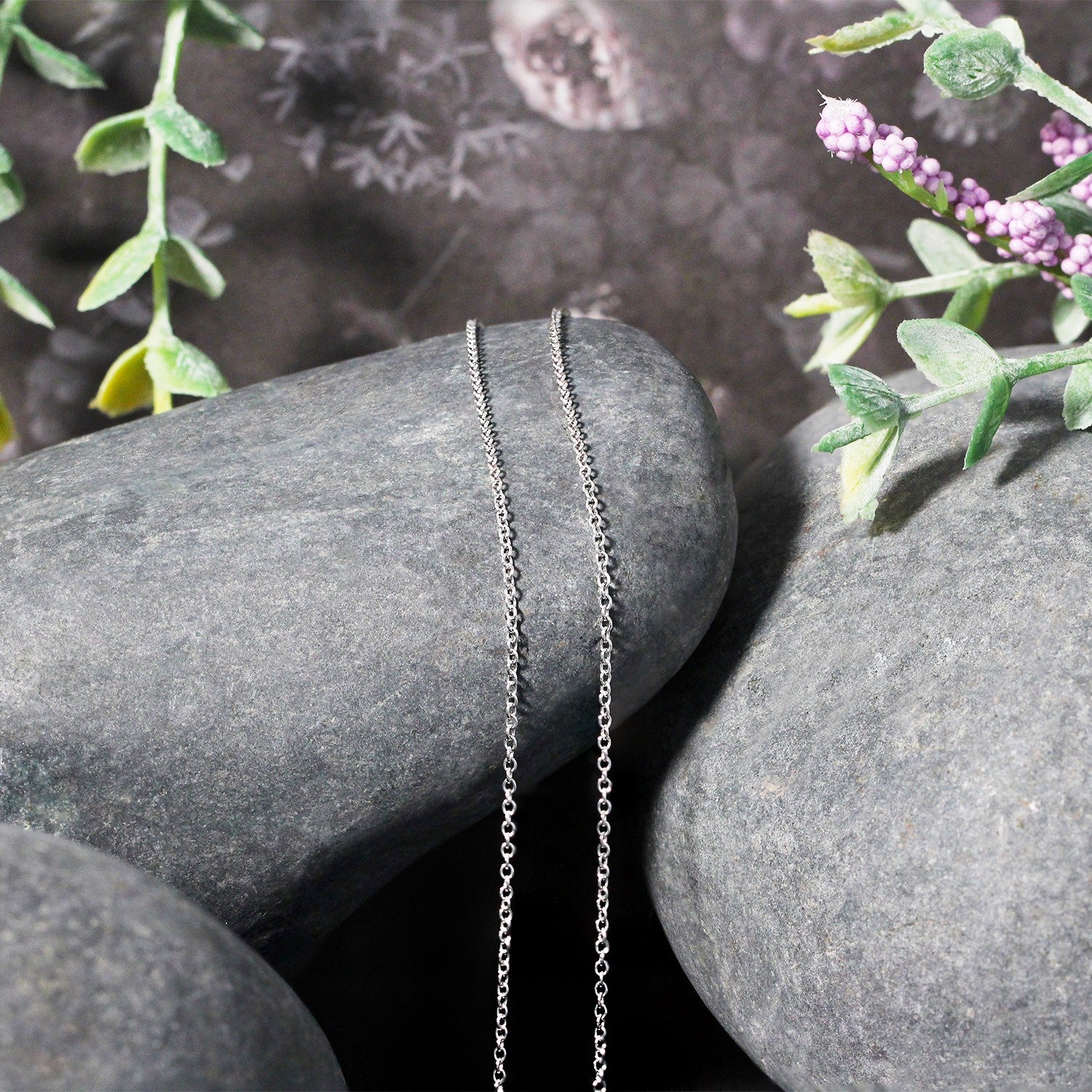 14k white gold round cable link chain, modern design, showcasing elegant simplicity and luxurious craftsmanship.