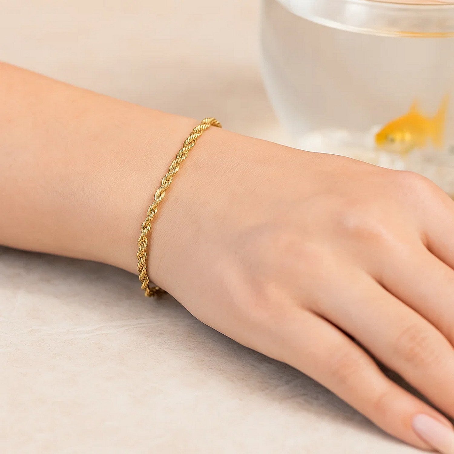 10k yellow gold diamond cut rope bracelet featuring a contemporary chain design, perfect for elegant styling.