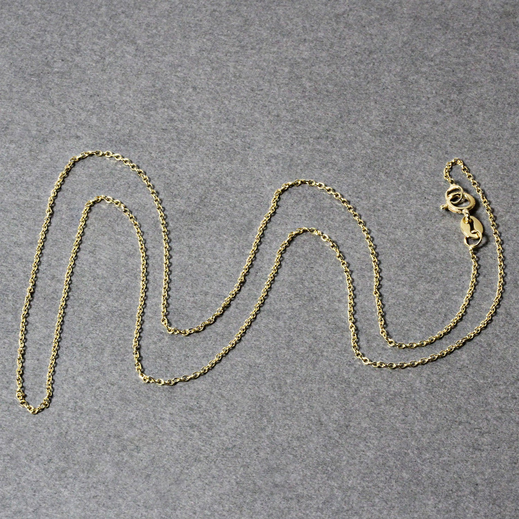 14k yellow gold diamond cut cable link chain, modern design with elegant links, perfect for layering or standalone wear.