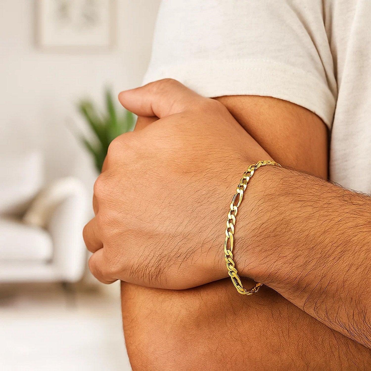 14k yellow gold link Figaro bracelet featuring contemporary chain design, perfect for elegant layering or solo wear.