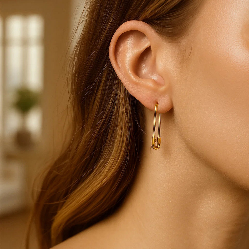14k yellow gold textured dangle earrings with modern design, perfect for elegant occasions and statement styling.