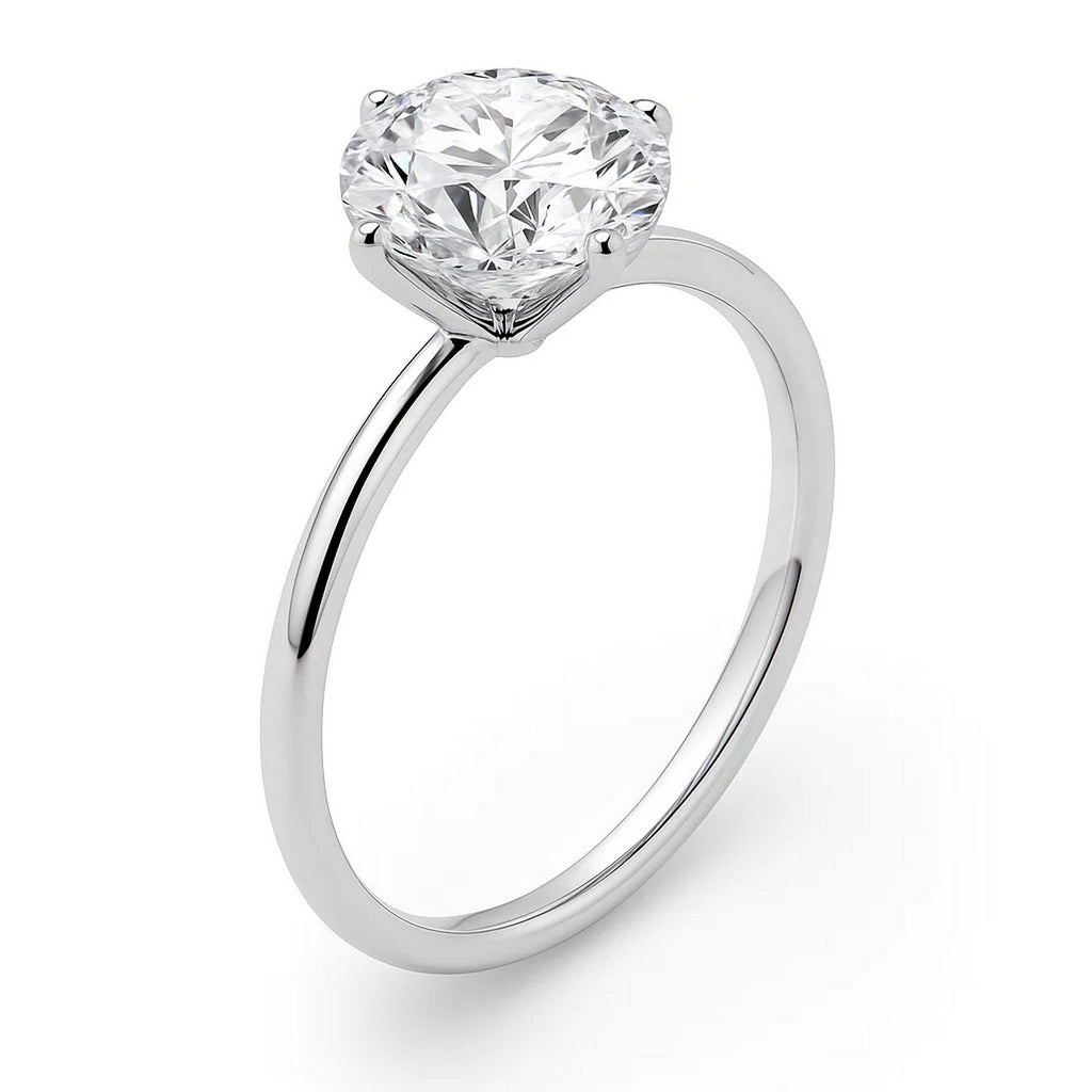 14k white gold solitaire ring featuring a stunning 5 carat round lab-grown diamond, embodying classic elegance.