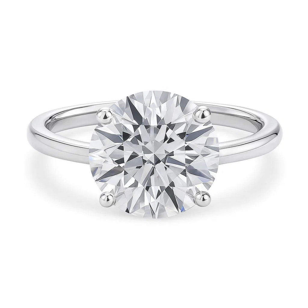 5 carat round diamond solitaire ring in 14k white gold, showcasing timeless elegance and exquisite craftsmanship.