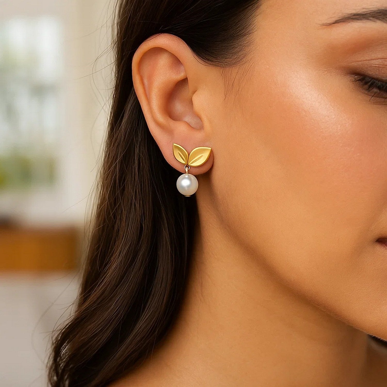 14k yellow gold drop earrings featuring lustrous pearls and elegant cherry leaf design for a modern touch.