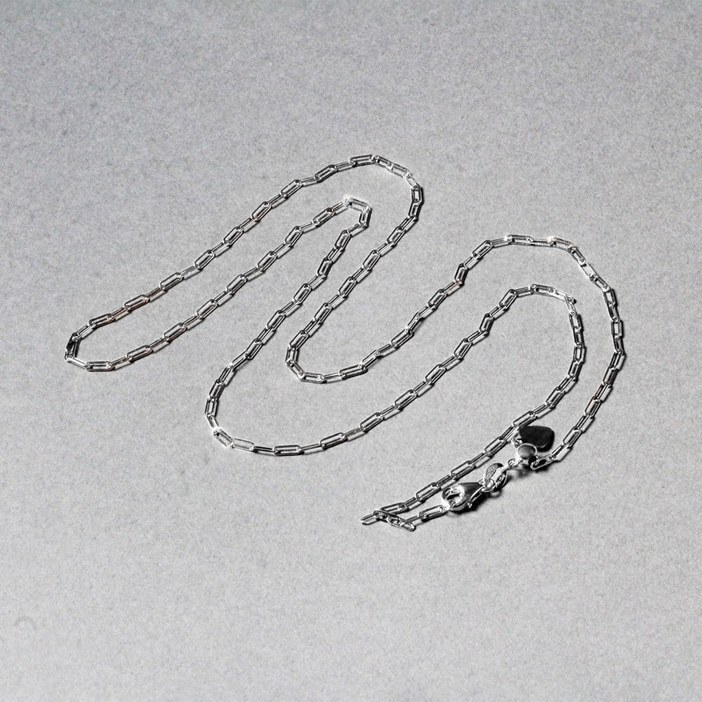 14k white gold adjustable paperclip chain with modern links, perfect for layering or wearing solo.