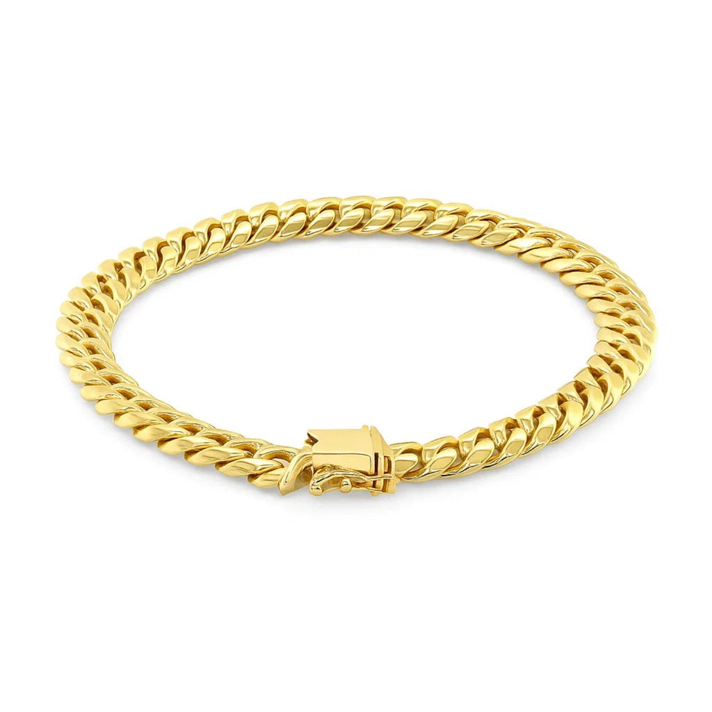 14k yellow gold classic Miami Cuban bracelet with solid links, showcasing timeless elegance and luxurious craftsmanship.