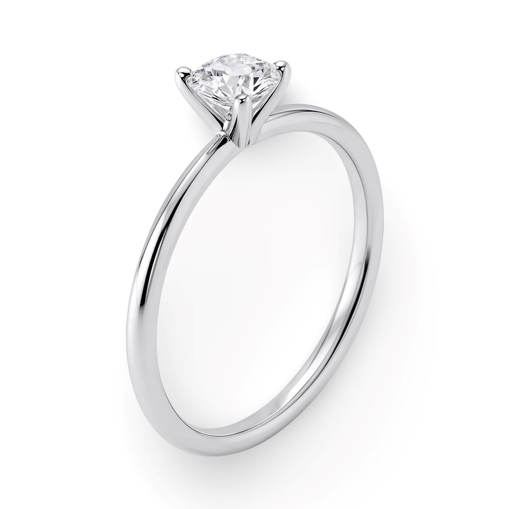 3/4 carat round lab-grown diamond solitaire ring in polished sterling silver, showcasing modern elegance and timeless beauty.