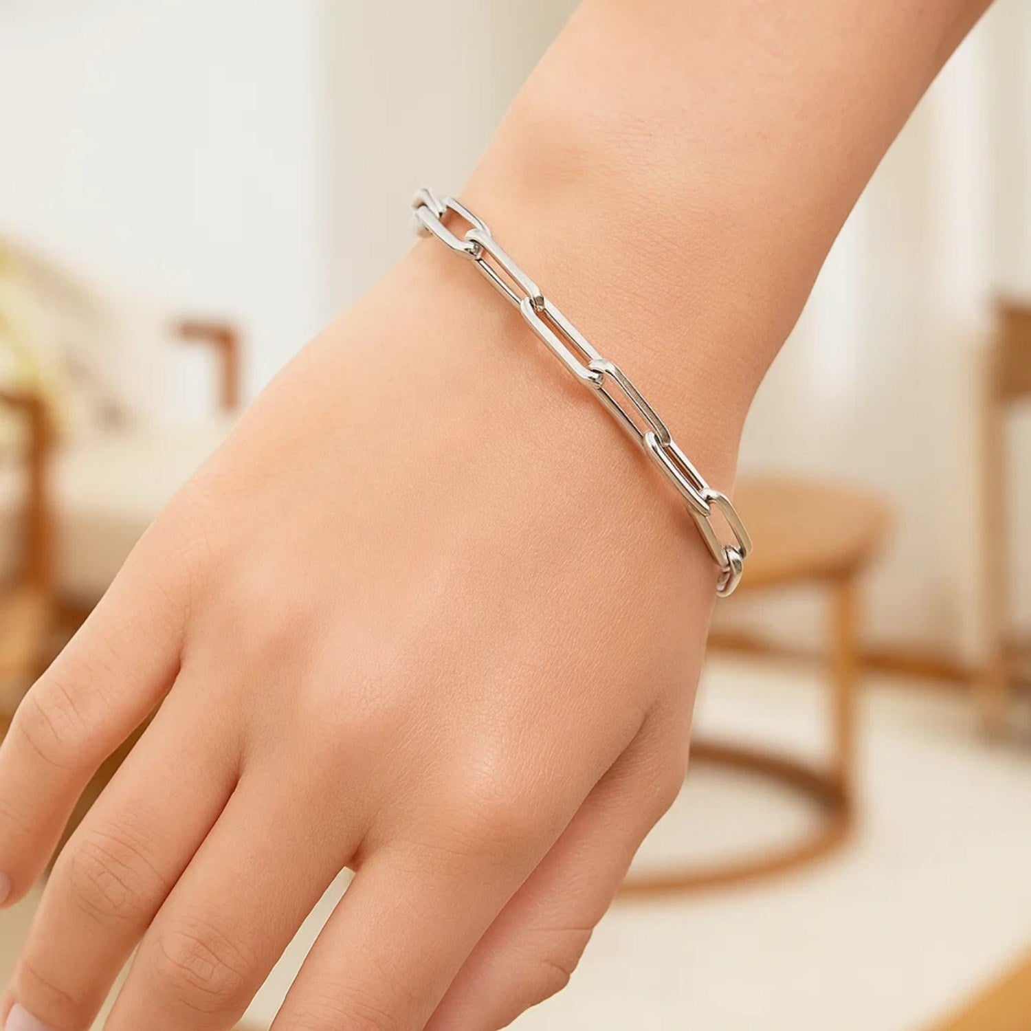 14K white gold extra wide paperclip chain bracelet featuring a contemporary design, perfect for luxury styling.