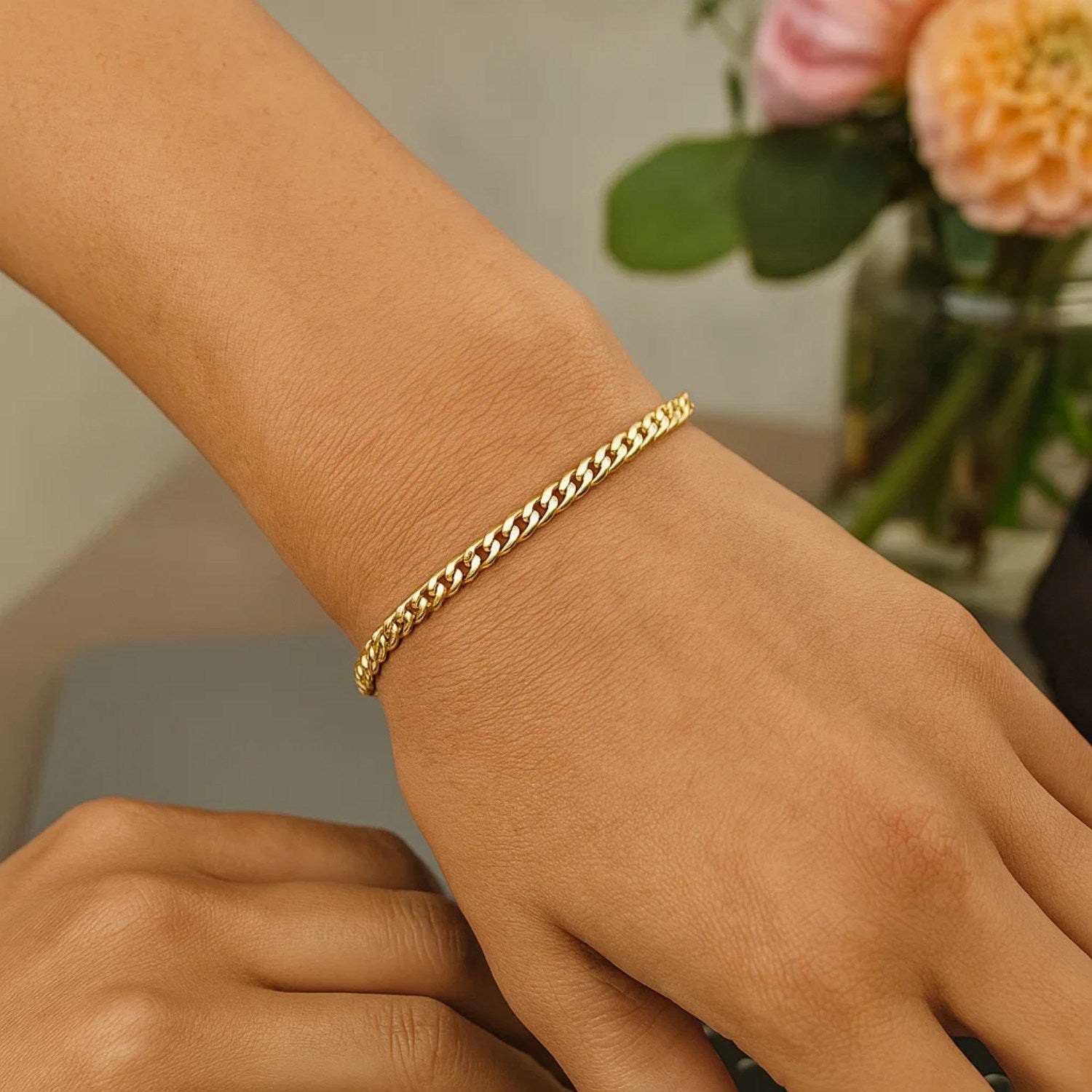 14k yellow gold classic Miami Cuban bracelet with round links, showcasing timeless elegance and luxurious craftsmanship.
