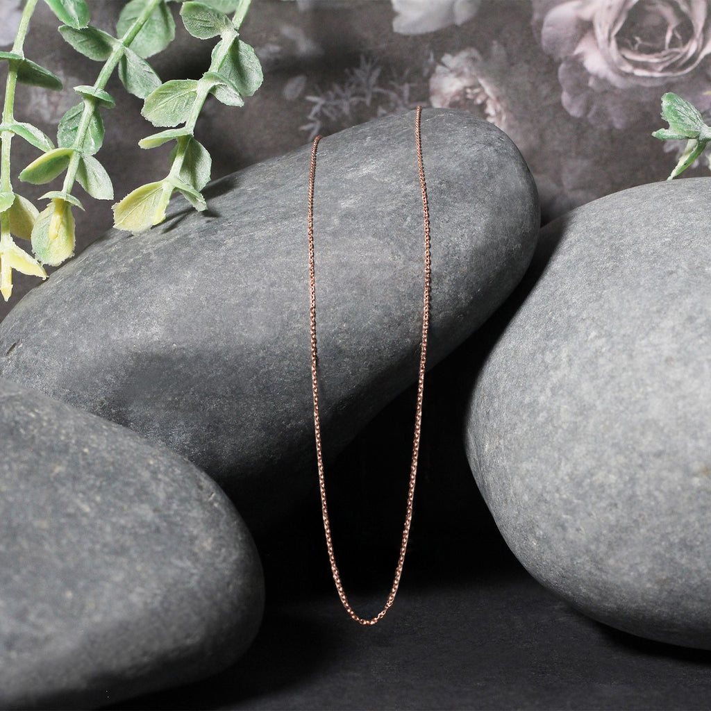 14k rose gold diamond cut cable link chain featuring modern design and exquisite craftsmanship, perfect for layering.