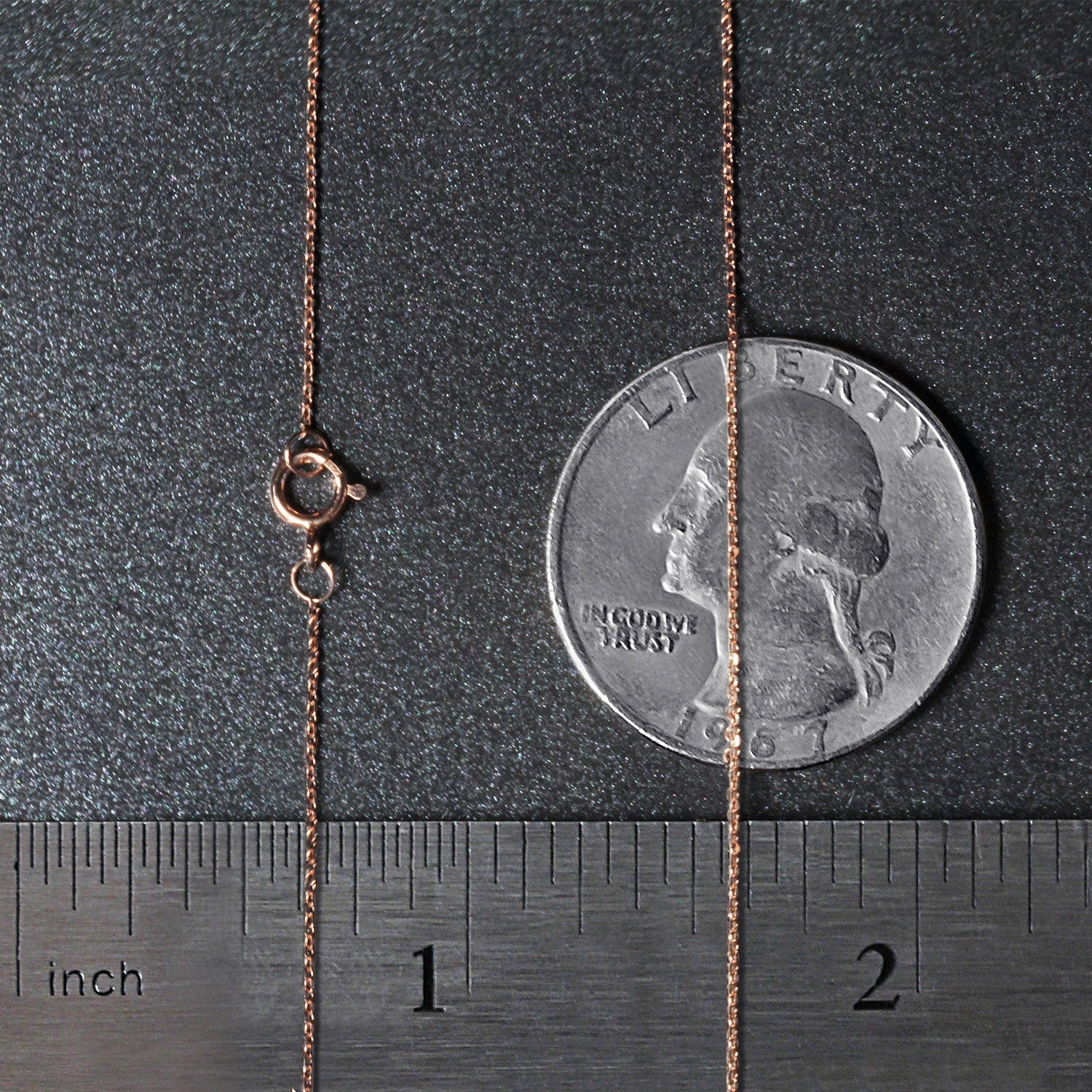 14k rose gold diamond cut cable link chain, modern design, featuring delicate links and a luxurious shine.