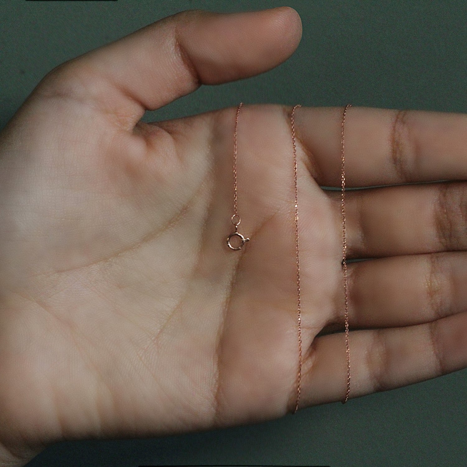 14k rose gold diamond cut cable link chain with modern design, featuring elegant interlocking links for a luxurious look.
