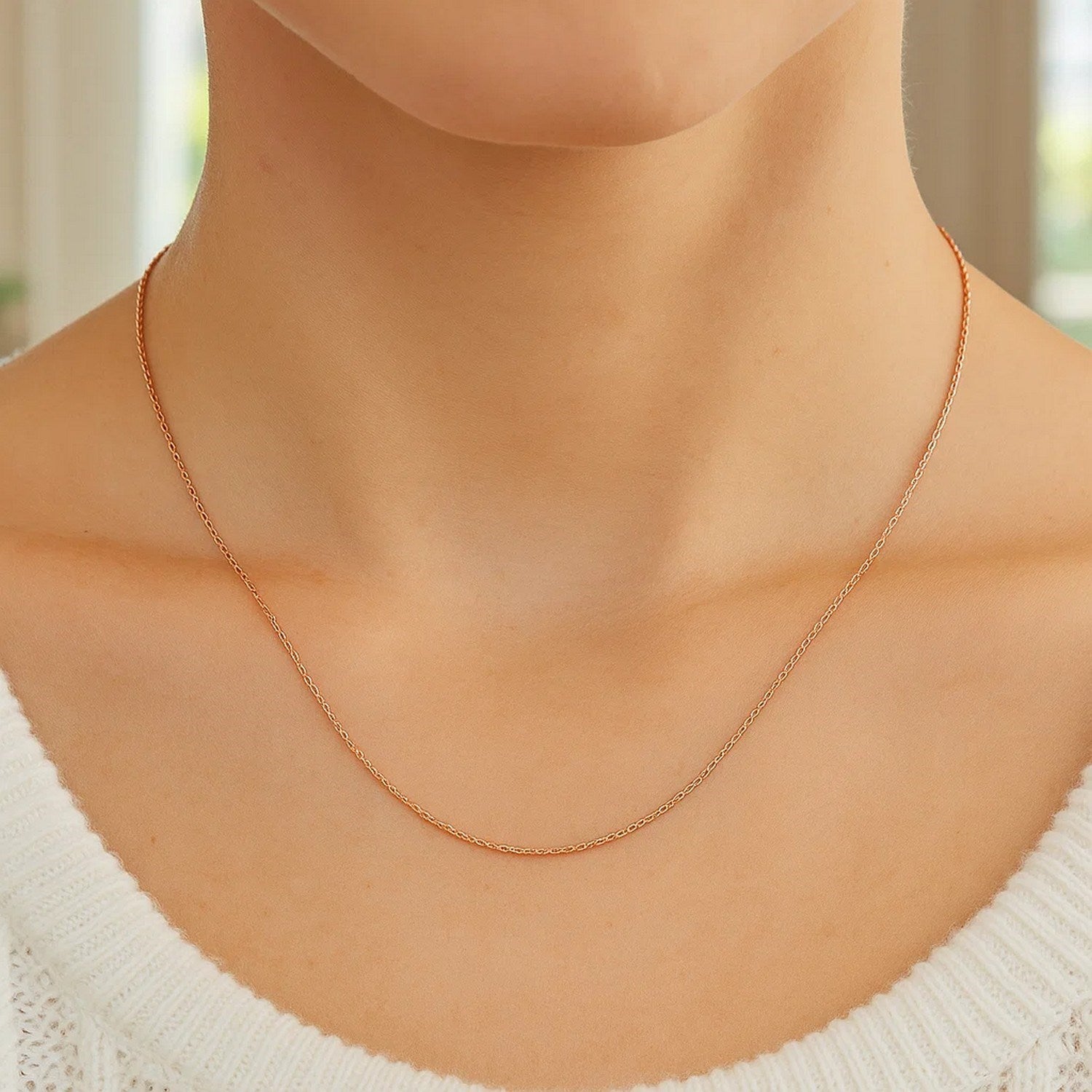 14k rose gold diamond cut cable link chain, modern design, featuring elegant links and a luxurious finish.