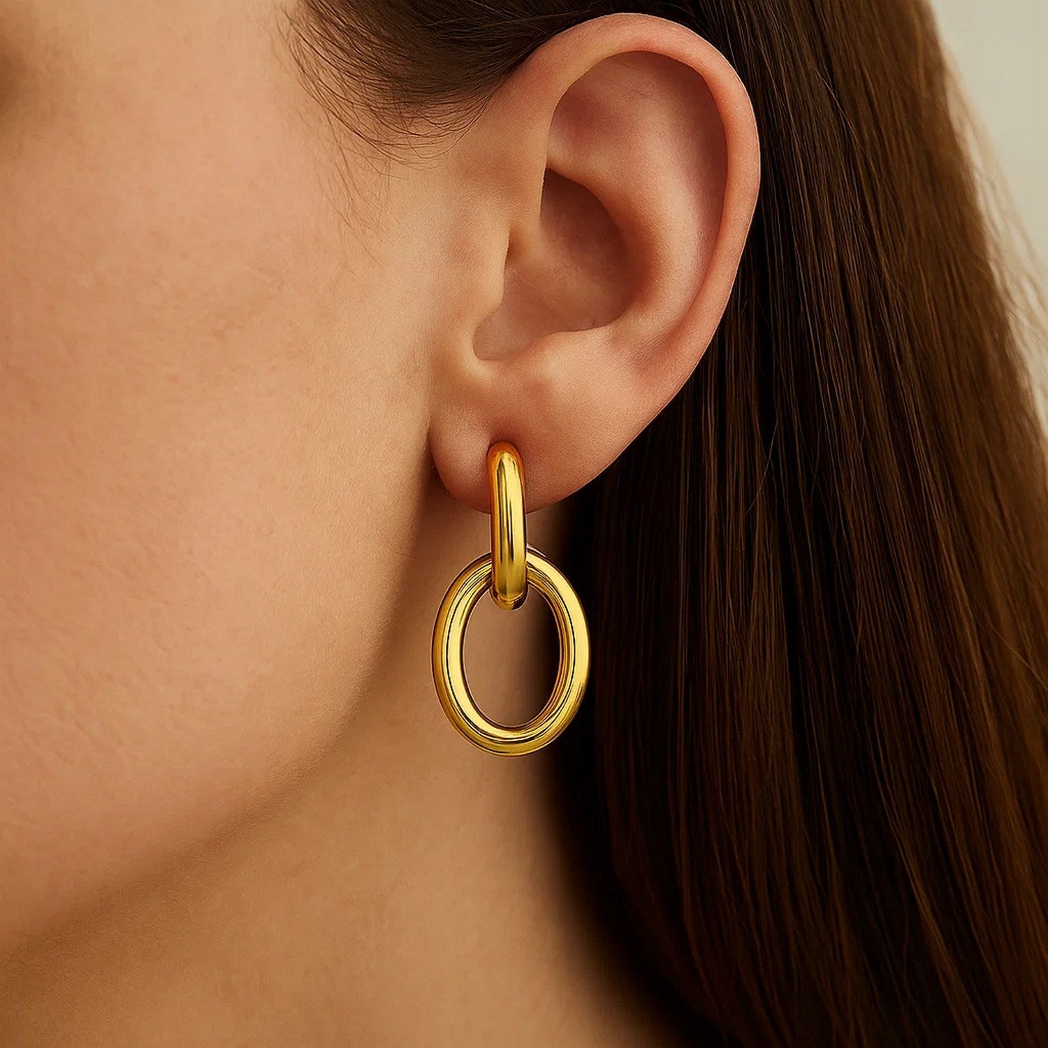 14k yellow gold interlocking link dangle earrings with a modern design, perfect for elegant occasions.