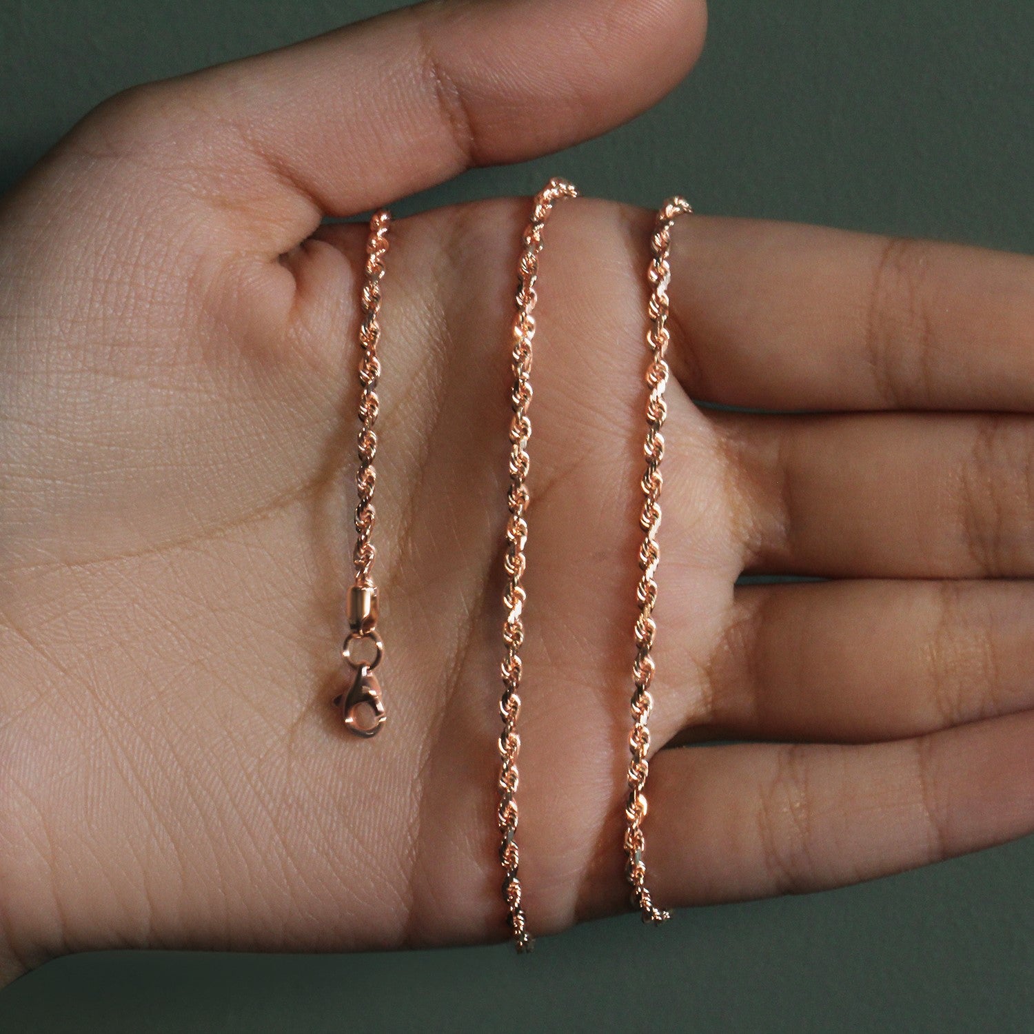 14k rose gold diamond cut rope chain, 2.30 mm, featuring a modern design and luxurious round links.